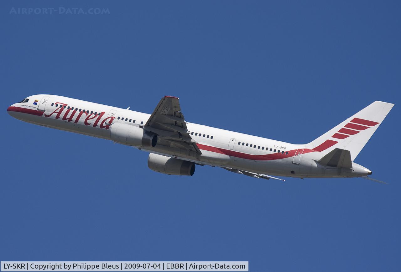 LY-SKR, 1999 Boeing 757-23N C/N 30233, Climbing and starting to bank on the SID