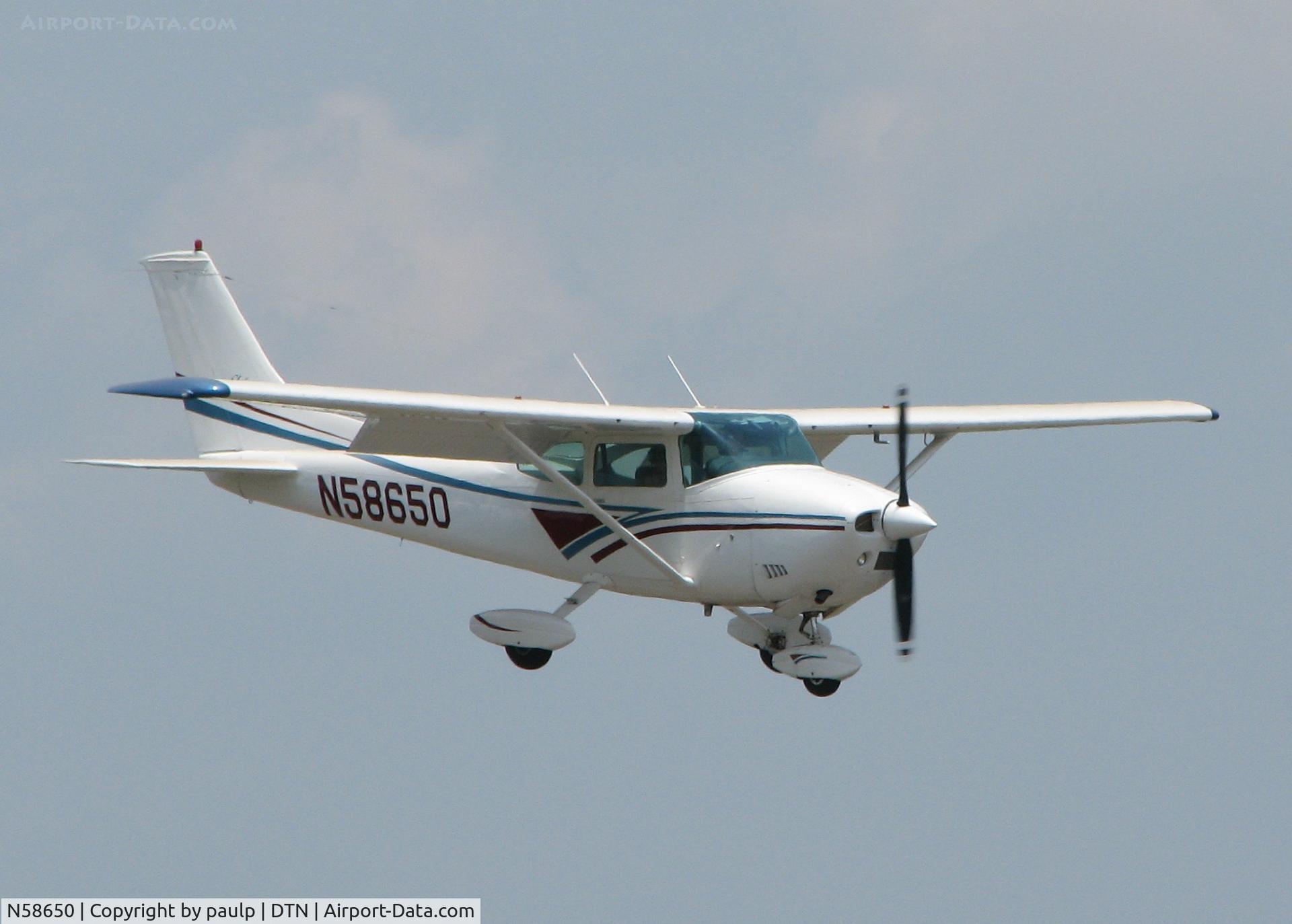 N58650, 1973 Cessna 182P Skylane C/N 18262205, Landing on runway 14 at Downtown Shreveport.