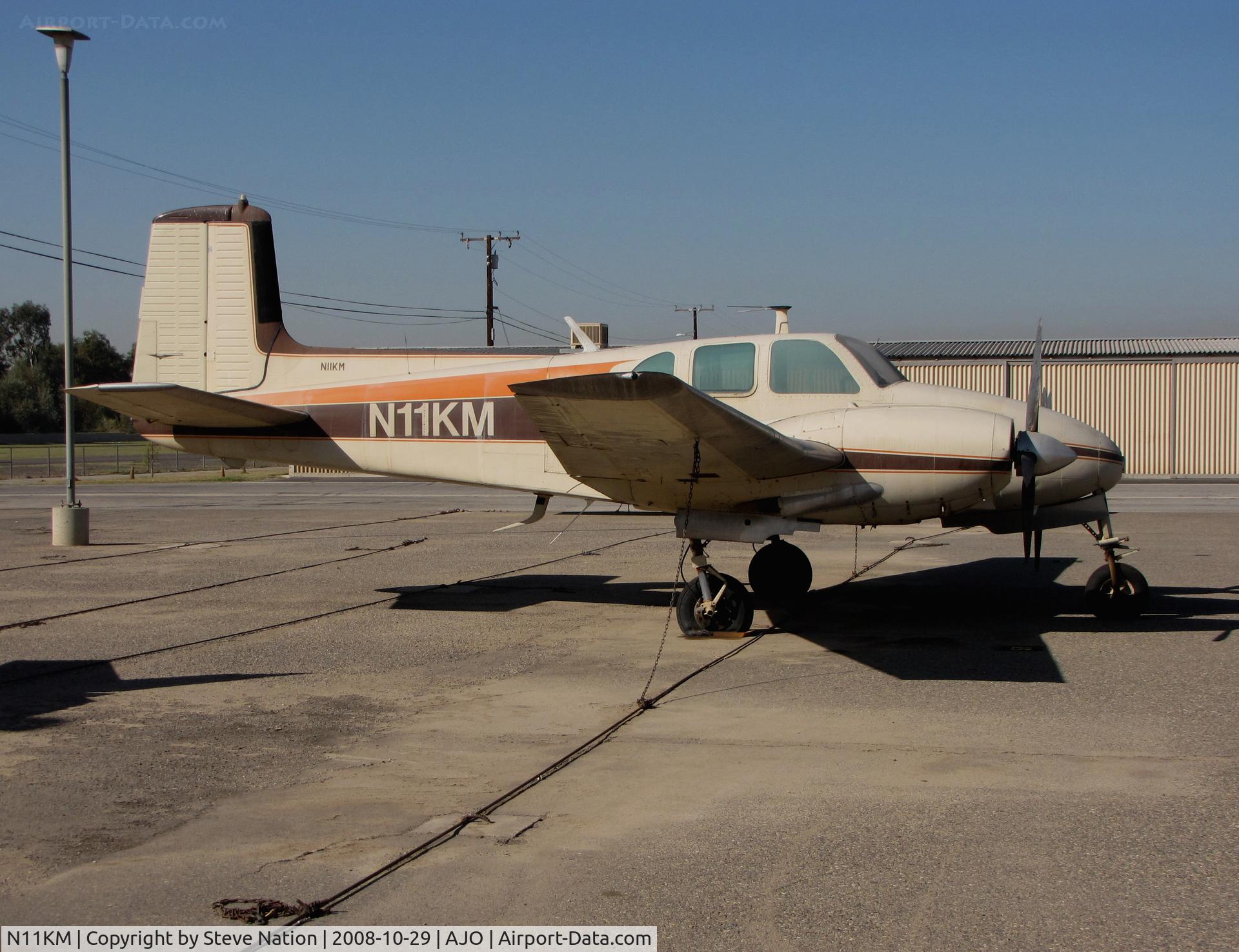 N11KM, 1960 Beech H50 C/N HH-127, 1960 Beech H50 twin Bonanza with large & small registration @ 