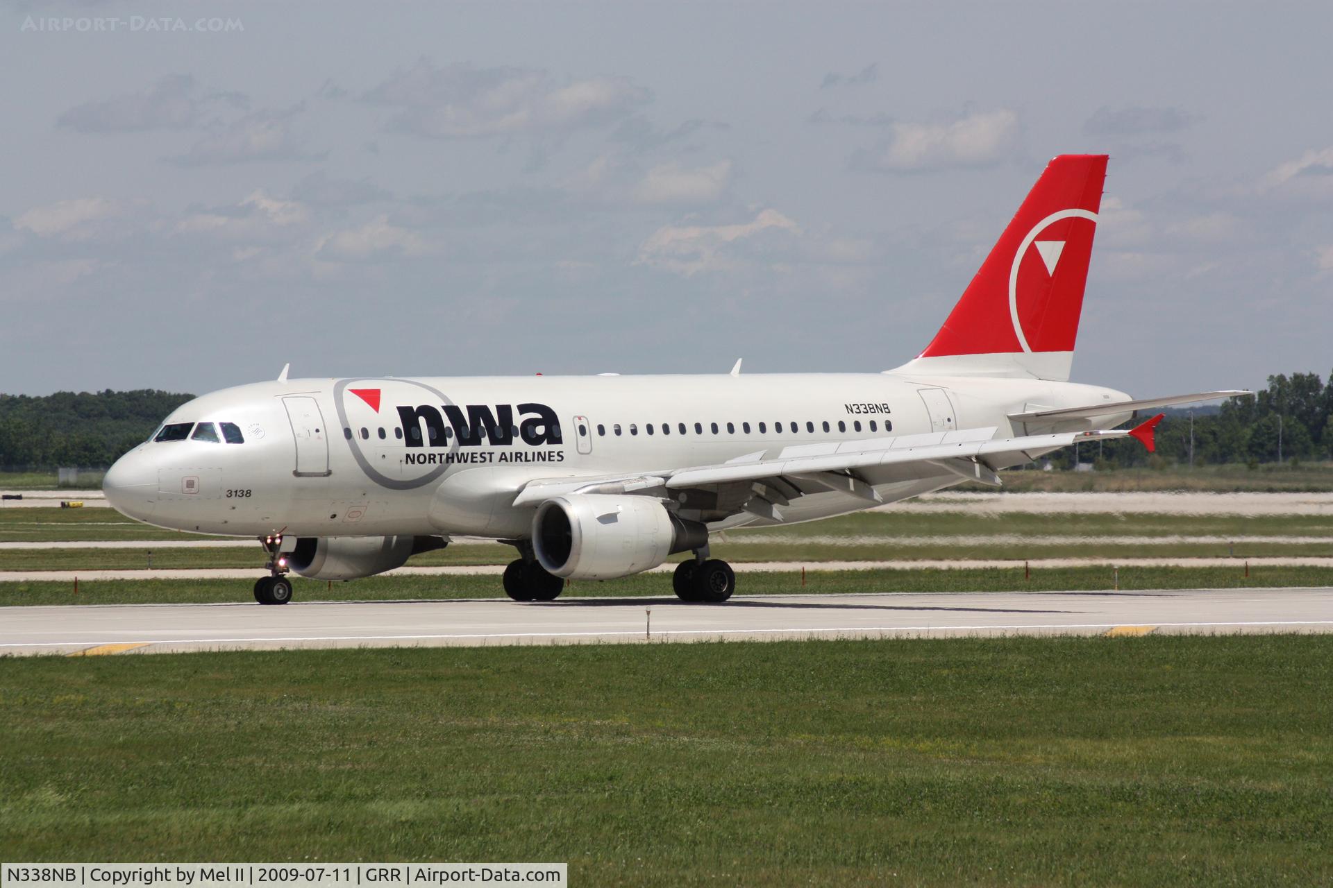 N338NB, 2002 Airbus A319-114 C/N 1693, NWA1240 - KDTW-KGRR - Landing RWY 26L