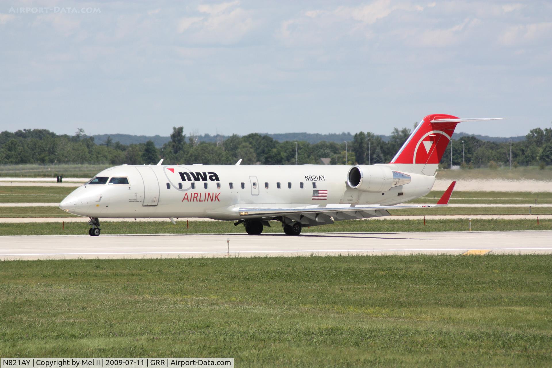 N821AY, 2005 Bombardier CRJ-200LR (CL-600-2B19) C/N 8021, FLG859A - KDTW-KGRR - Landing RWY 26L