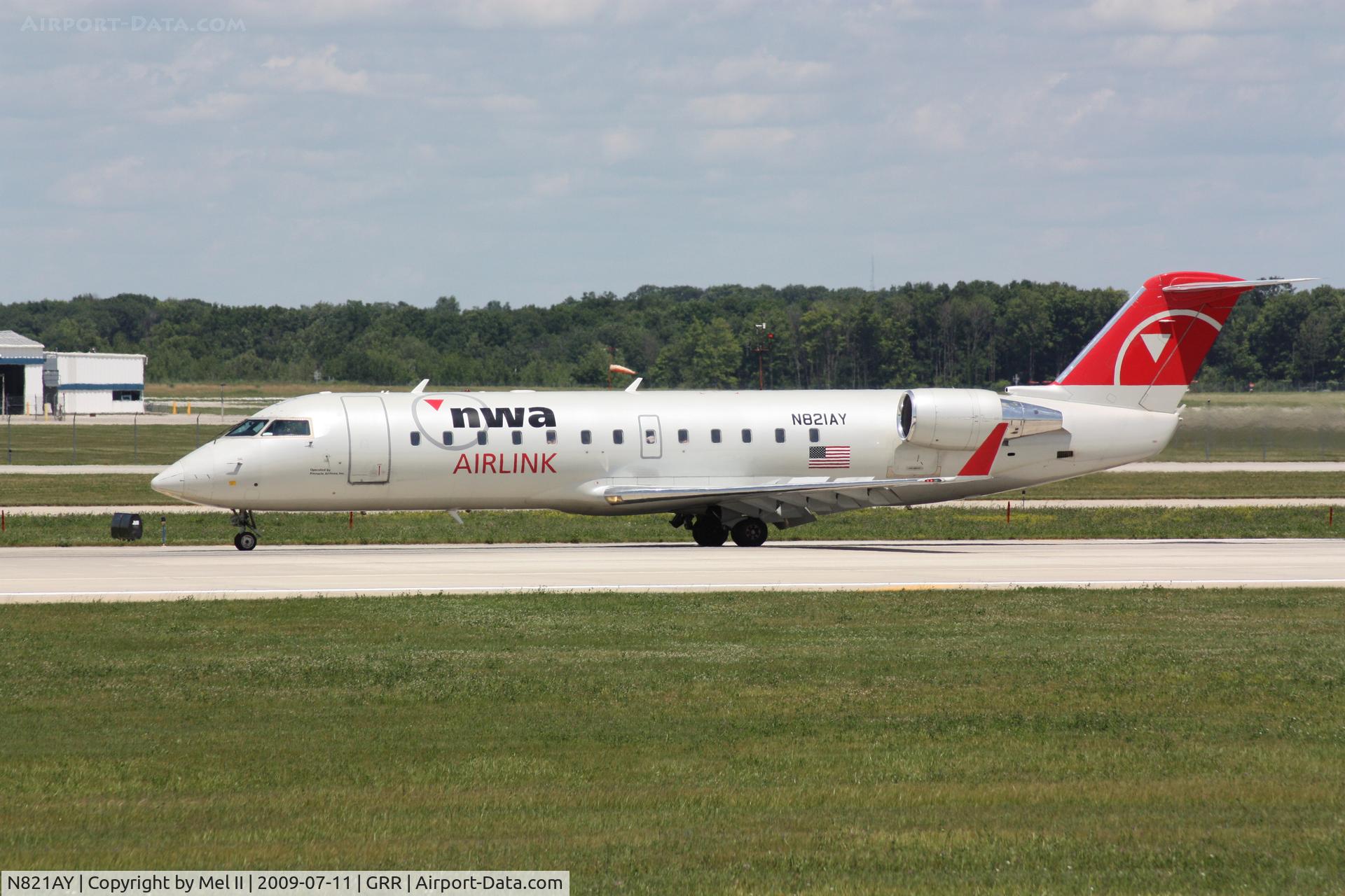 N821AY, 2005 Bombardier CRJ-200LR (CL-600-2B19) C/N 8021, FLG859A - KDTW-KGRR - Landing RWY 26L