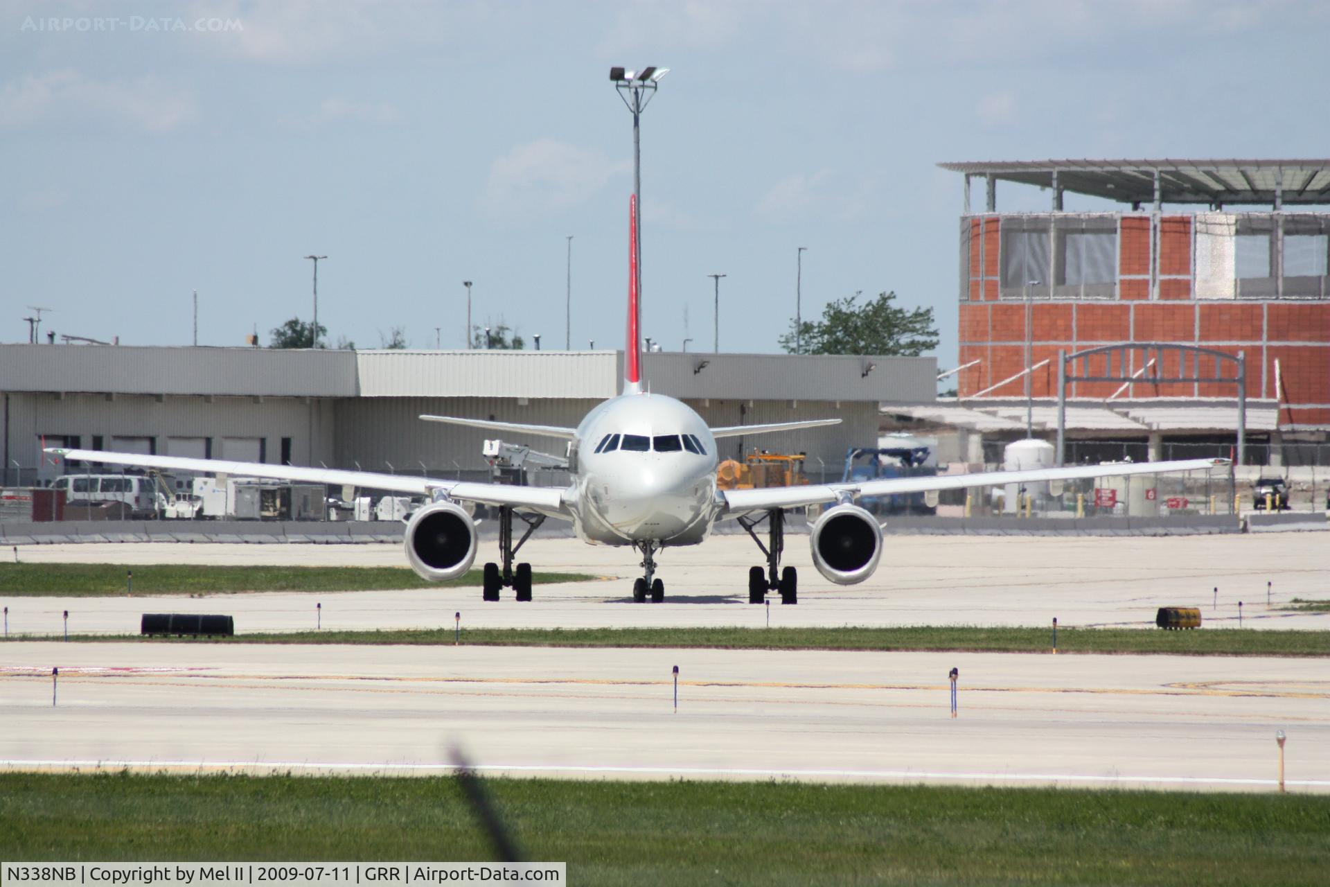 N338NB, 2002 Airbus A319-114 C/N 1693, NWA370 - KGRR-KDTW - Taxi For Departure RWY 26L