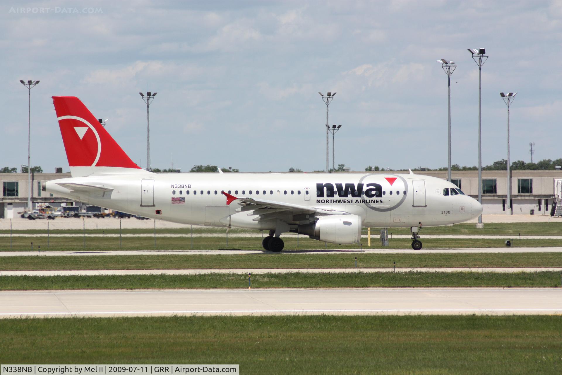 N338NB, 2002 Airbus A319-114 C/N 1693, NWA370 - KGRR-KDTW - Taxi For Departure RWY 26L