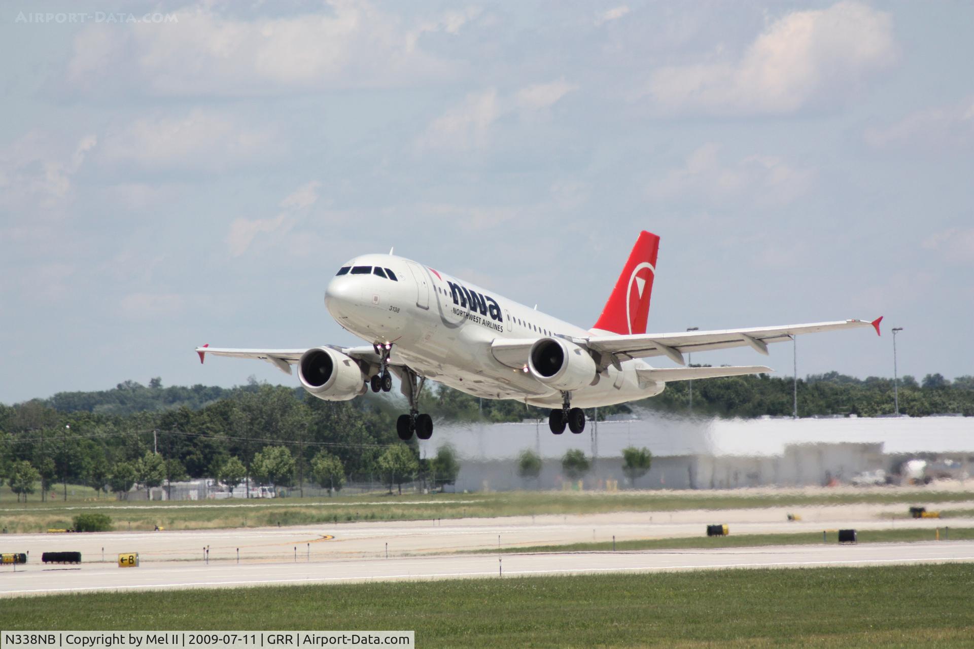 N338NB, 2002 Airbus A319-114 C/N 1693, NWA370 - KGRR-KDTW - Departing RWY 26L