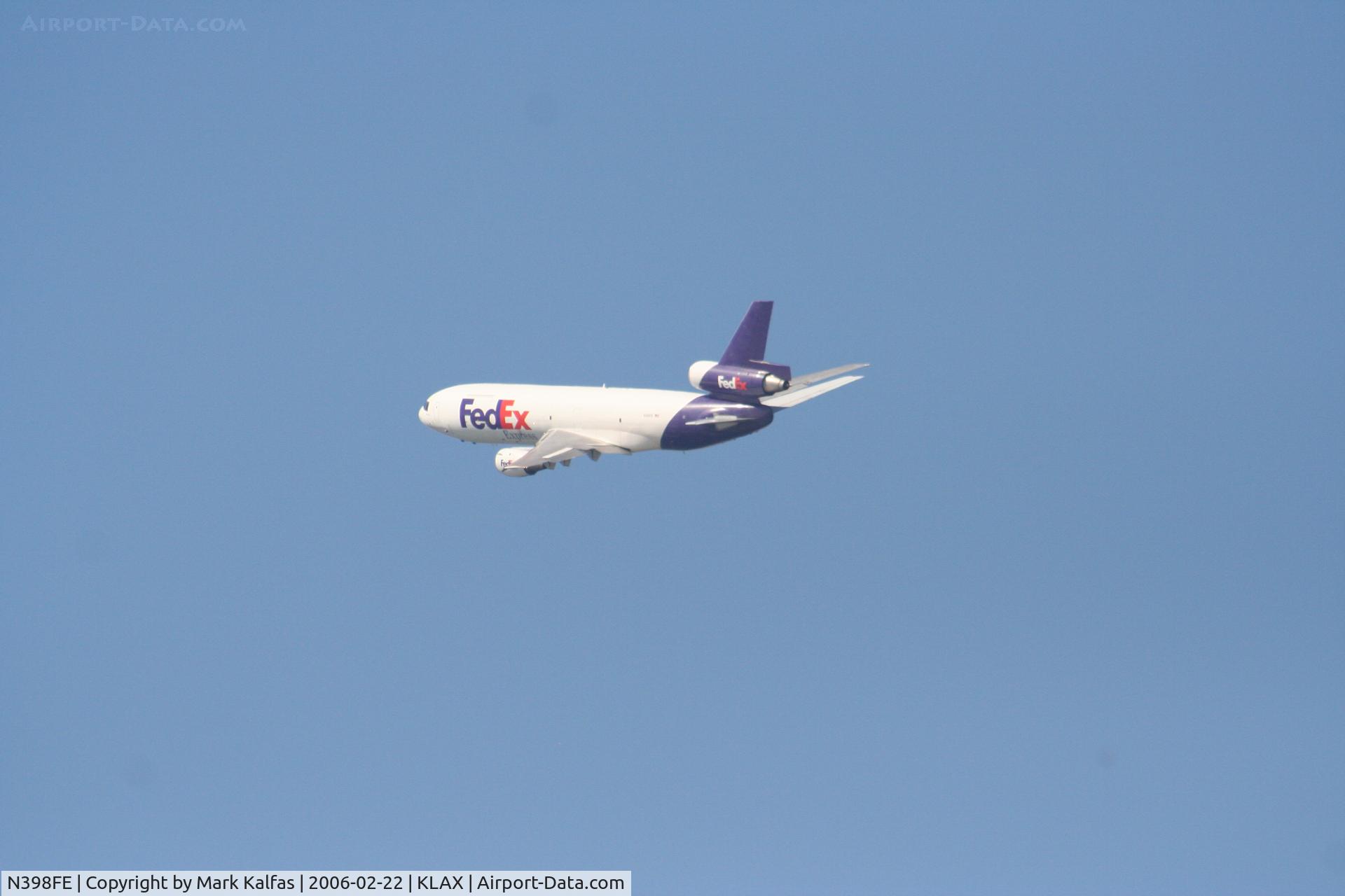 N398FE, 1979 McDonnell Douglas MD-10-10F C/N 46634, fed Ex, N396FE, DC-10-10F left tun at the shore departing 25L KLAX