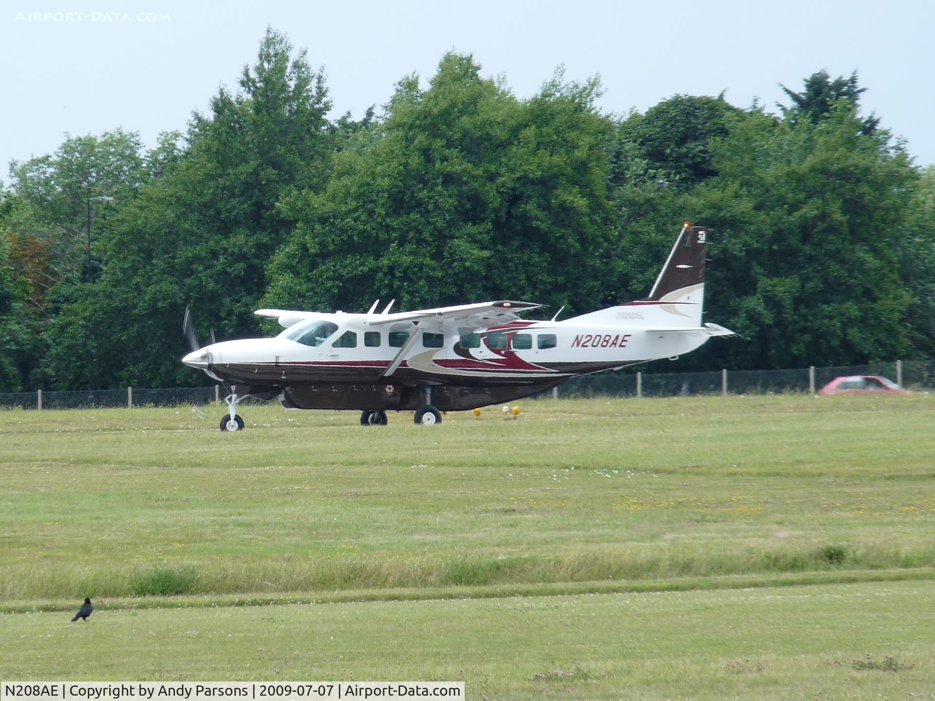 N208AE, 2009 Cessna 208B Grand Caravan C/N 208B2094, Departing Cambridge