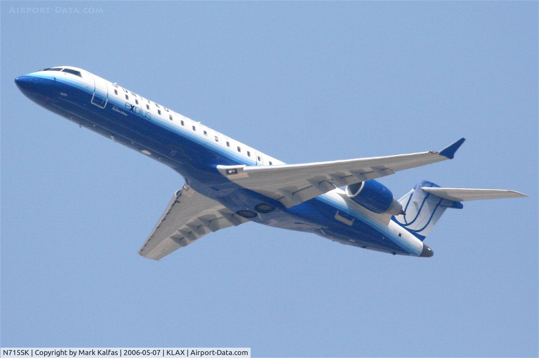 N715SK, 2004 Bombardier CRJ-700 (CL-600-2C10) Regional Jet C/N 10179, United Express, (Skywest) Canadair CL-600-2C10 Regional Jet CRJ-700 departing 25R KLAX