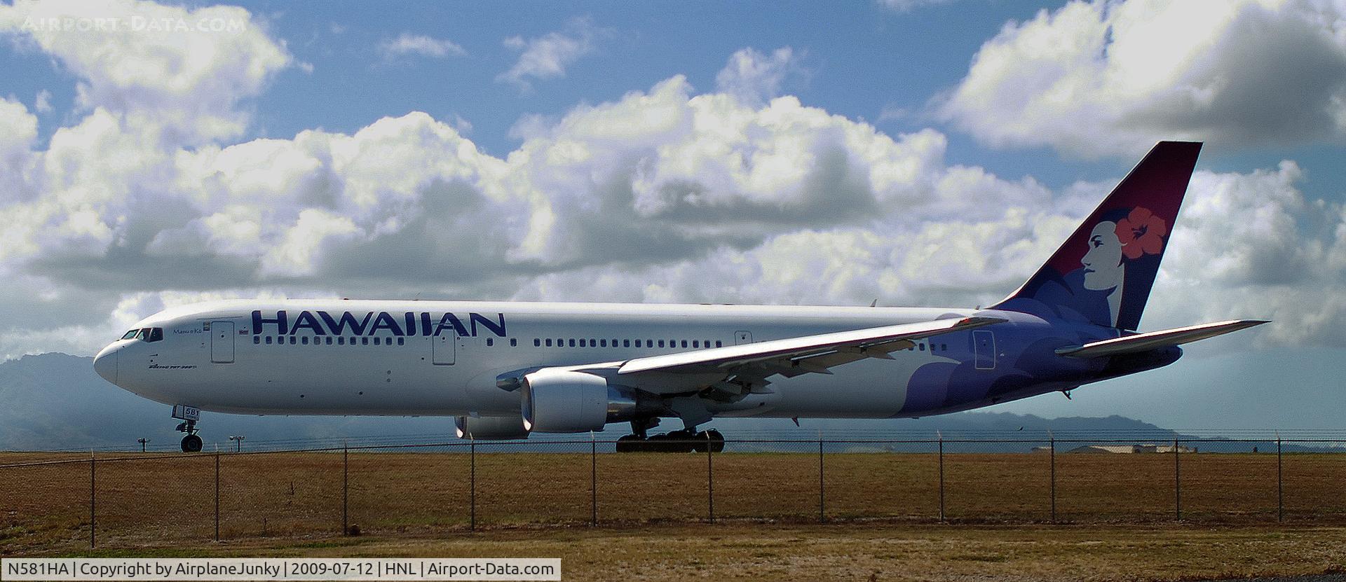 N581HA, 2001 Boeing 767-33A C/N 28141, Hawaiian Flight 18 Taxiing out to 8R at Honolulu Intl for it's flight to Las Vegas.