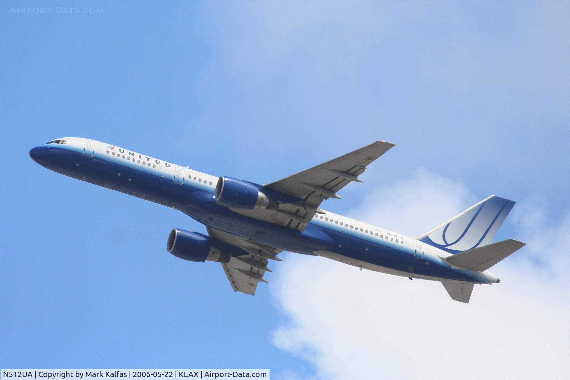 N512UA, 1990 Boeing 757-222 C/N 24809, United Airlines Boeing 757-222, N512UA departs KLAX RWY 25R into the soup..