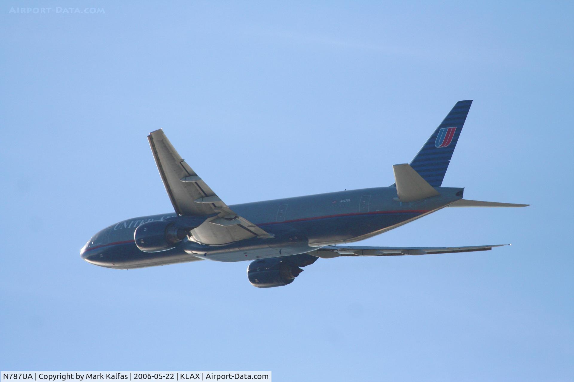 N787UA, 1997 Boeing 777-222 C/N 26939, United Airlines  Boeing 777-222, N787UA departs KLAX RWY 25R