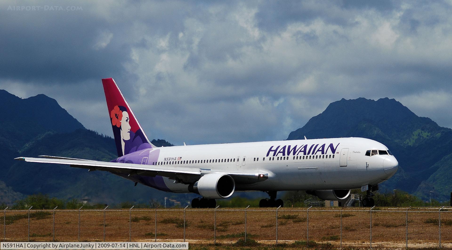 N591HA, 2003 Boeing 767-33A C/N 33423, Hawaiian Flight 22 taxis out to Honolulu's reef runway for departure to Seattle