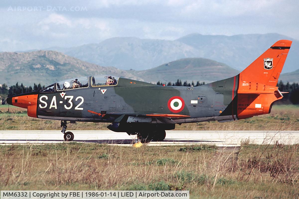 MM6332, Fiat G-91T/1 C/N 62, returning from a gunnery mission at the Capo Frasca range
