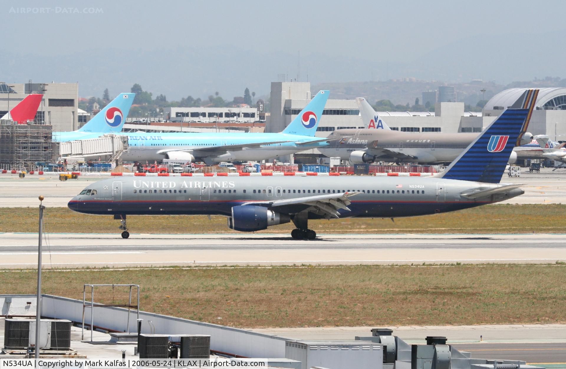 N534UA, 1991 Boeing 757-222F C/N 25129, United Airlines Boeing 757-222, N534UA departs KLAX RWY 25R