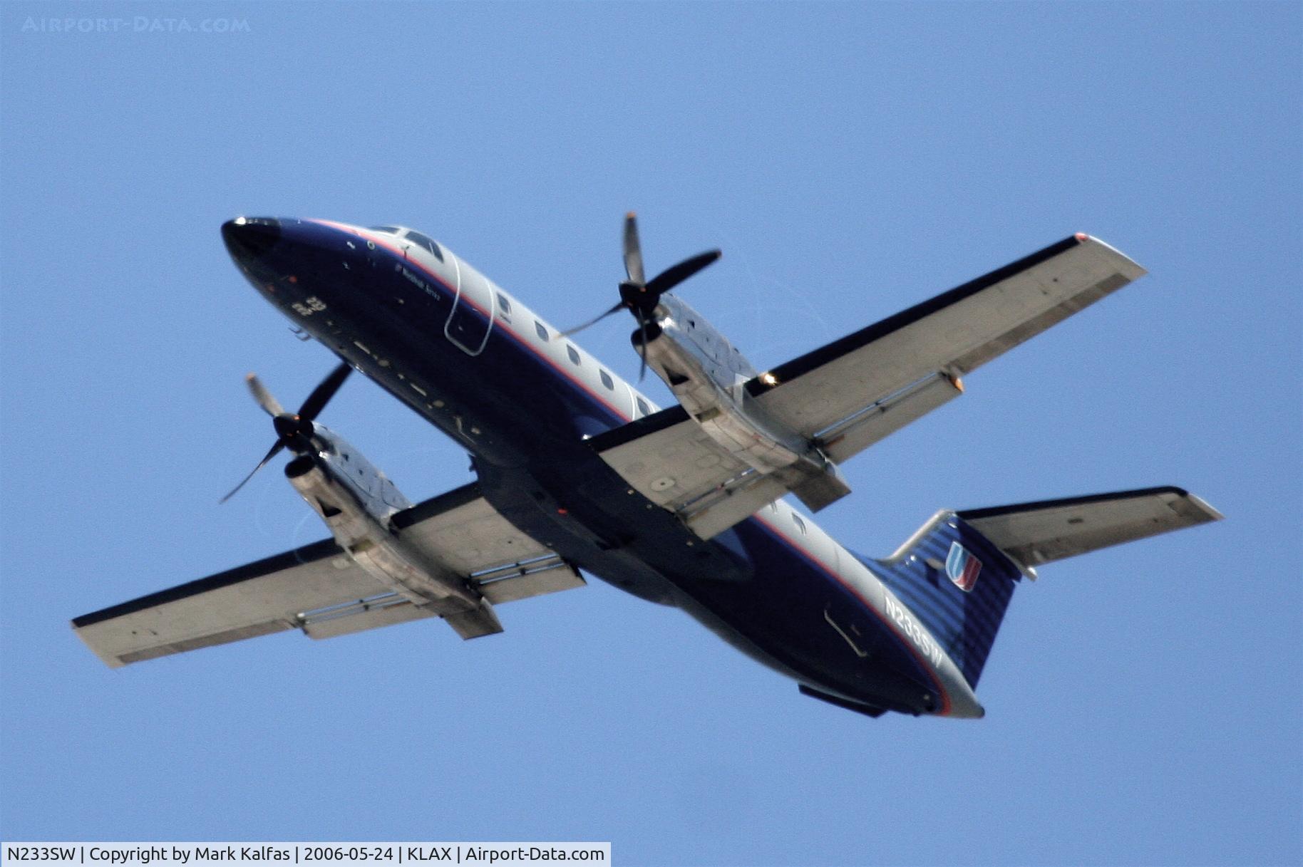 N233SW, 1995 Embraer EMB-120ER Brasilia C/N 120.307, United Express, (Skywest) EMB-120ER, N233SW departing 25R KLAX