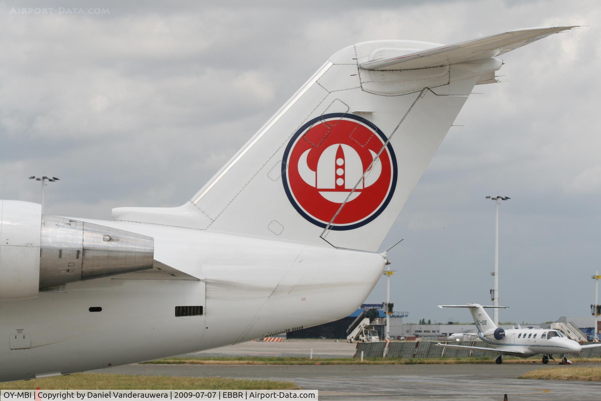 OY-MBI, 2000 Canadair CRJ-200LR (CL-600-2B19) C/N 7436, parked on General Aviation apron (Abelag)