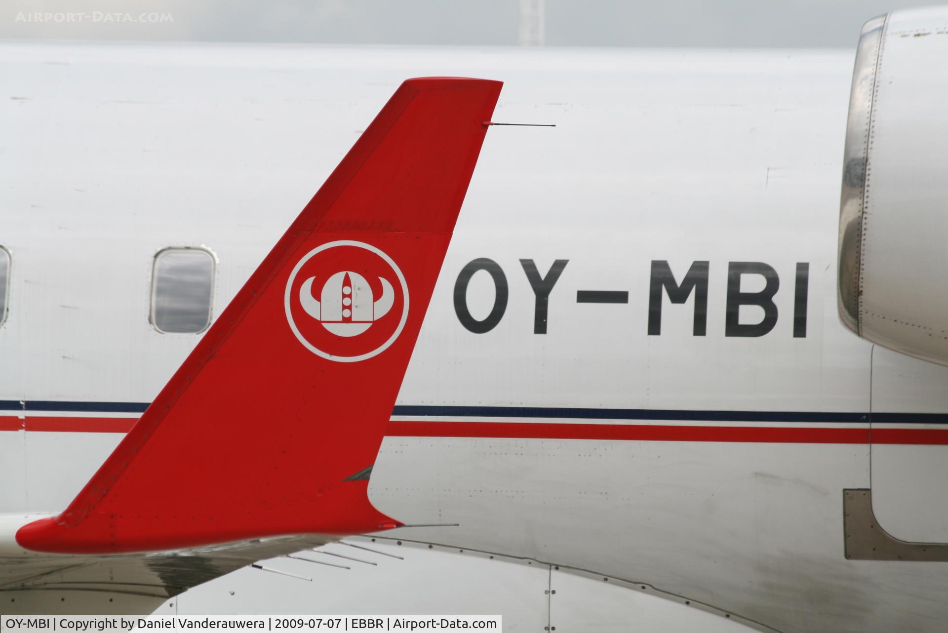 OY-MBI, 2000 Canadair CRJ-200LR (CL-600-2B19) C/N 7436, parked on General Aviation apron (Abelag)
