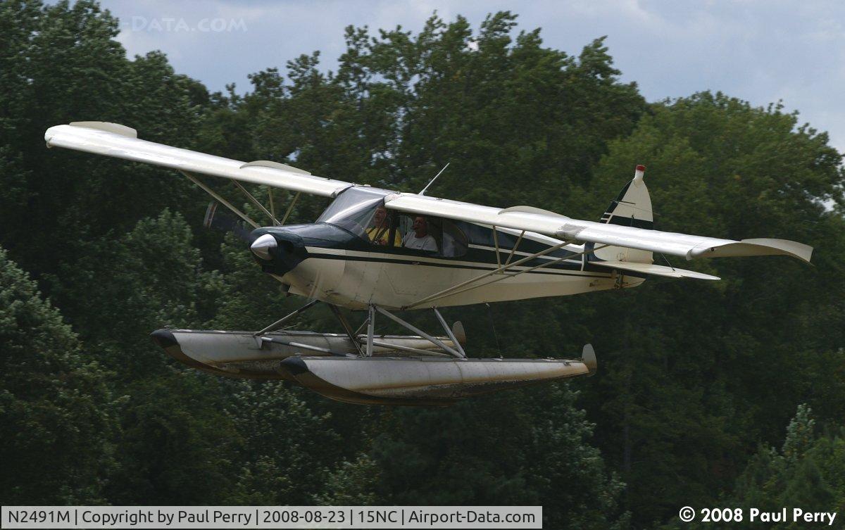N2491M, 1947 Piper PA-12 Super Cruiser C/N 12-1698, Making a pass, showing off her old floats