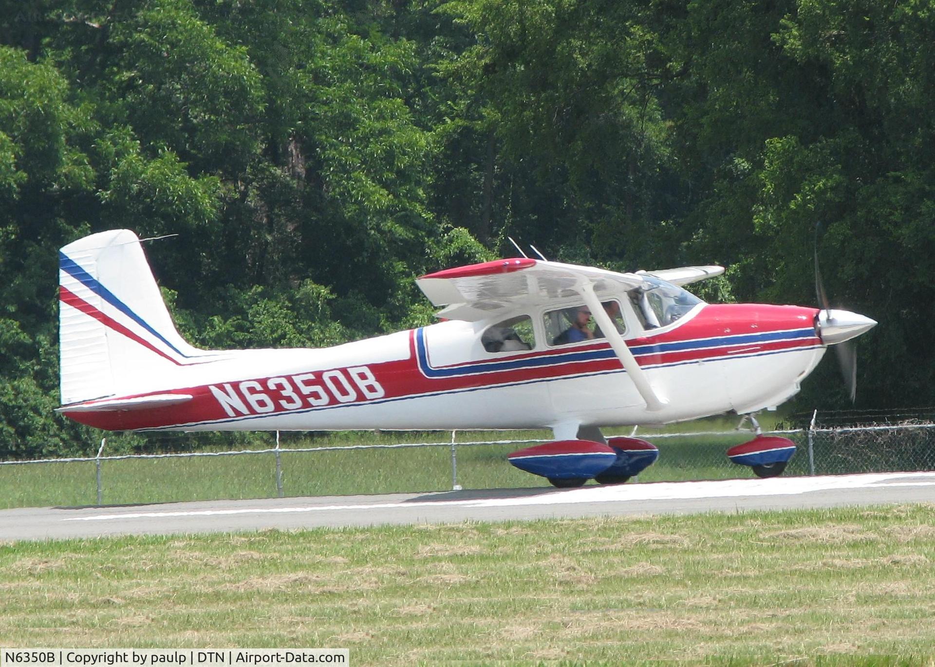 N6350B, 1957 Cessna 182A Skylane C/N 34250, Starting to roll for take off on runway 14 at the Shreveport Downtown airport.