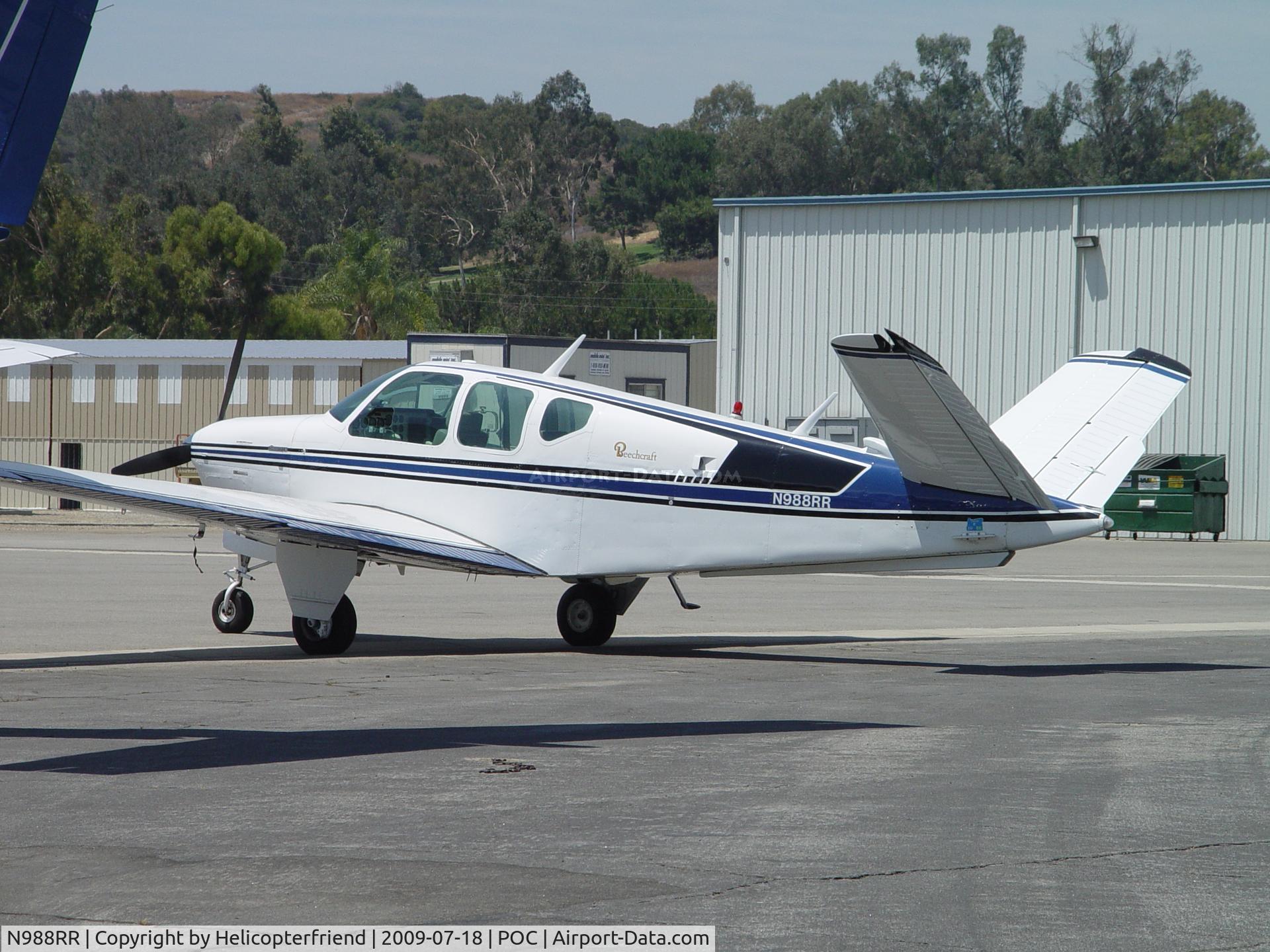 N988RR, 1959 Beech M35 Bonanza C/N D-6179, Parked at Howard Aviation