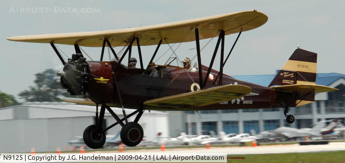 N9125, 1931 New Standard D-25A C/N 205, take off at Lakeland Linder FL