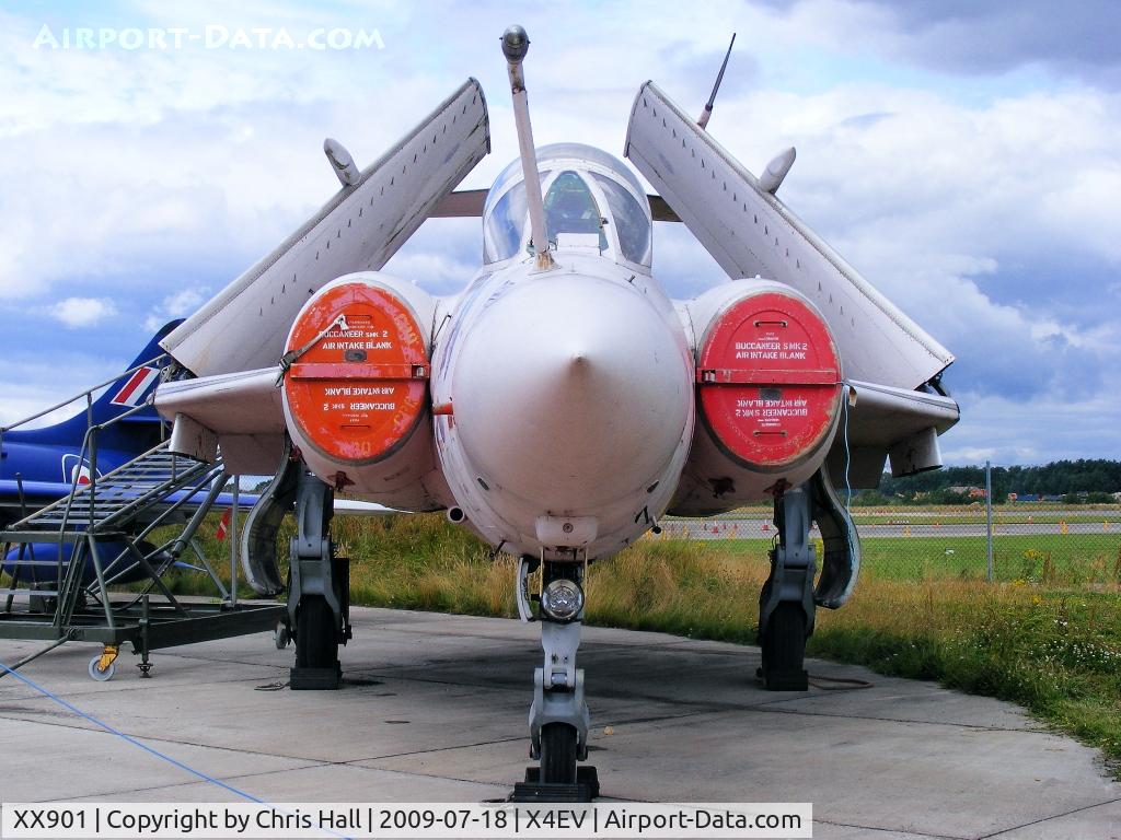 XX901, 1977 Hawker Siddeley Buccaneer S.2B C/N B3-06-75, Buccaneer S2B. XX901 had an illustrious service record with the Royal Air Force. It was saved from scrapping by the Buccaneer Aircrew Association and is painted in the Gulf War scheme, including the 'Flying Mermaid' nose art.