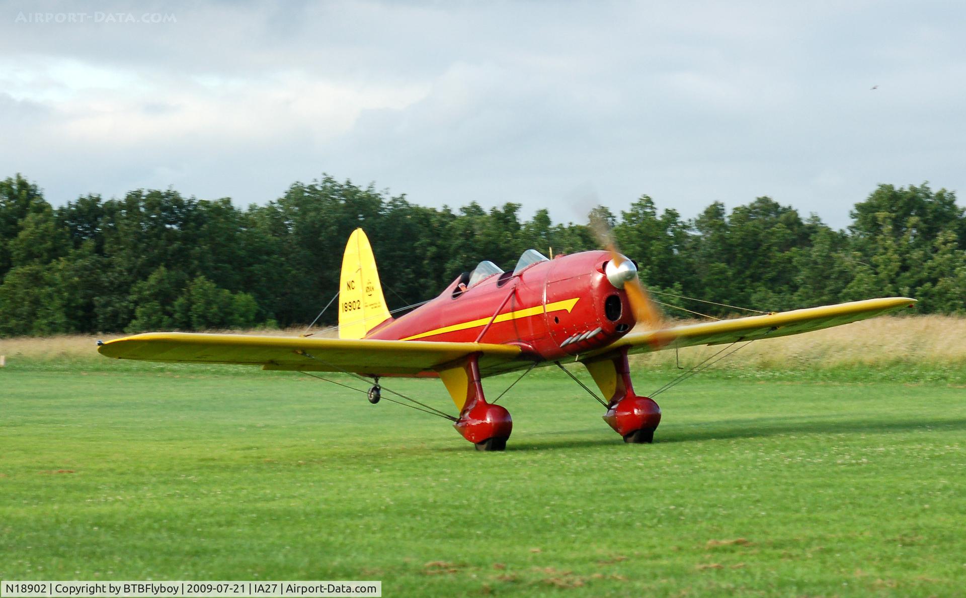 N18902, 1938 Ryan Aeronautical ST-A C/N 198, Just about to break ground during an evening test flight at Antique Airfield near Blakesburg, IA