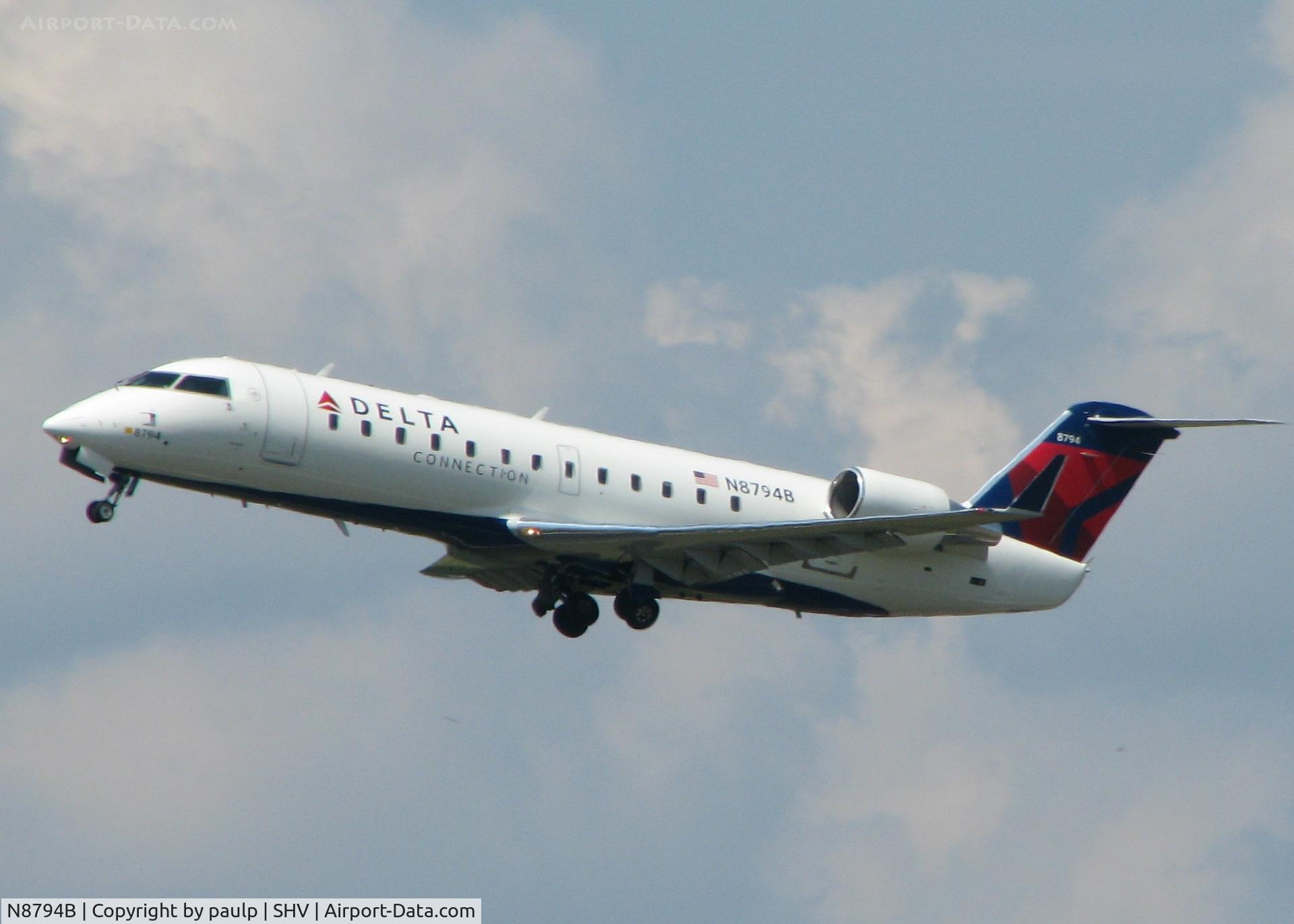 N8794B, 2003 Bombardier CRJ-200 (CL-600-2B19) C/N 7794, Taking off from runway 14 at Shreveport Regional.