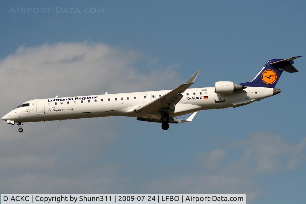 D-ACKC, 2006 Bombardier CRJ-900LR (CL-600-2D24) C/N 15078, Landing rwy 32L with additional '50 Jahre' sticker...