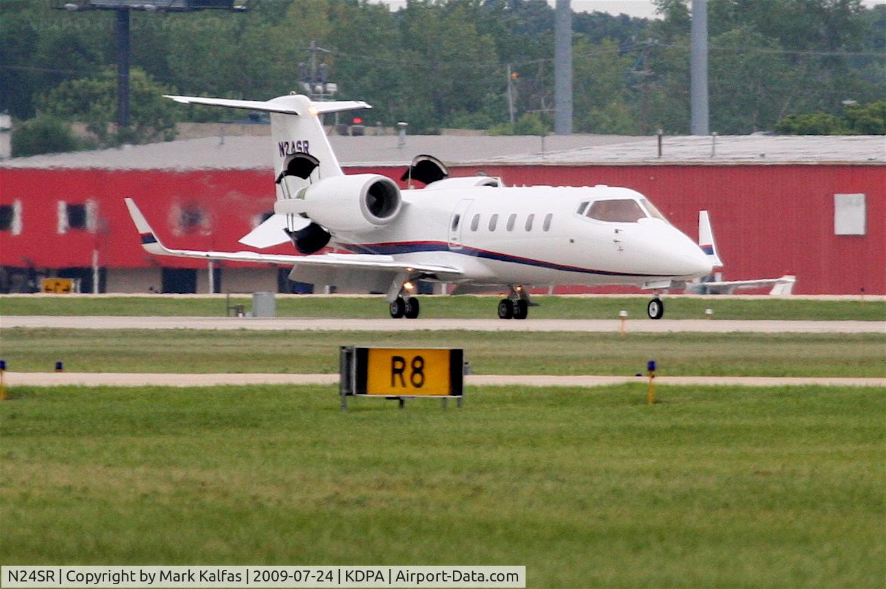 N24SR, 2001 Learjet 60 C/N 234, Sears Roebuck Learjet 60, deploying reversers, arriving 20R KDPA after a trip from KAVL