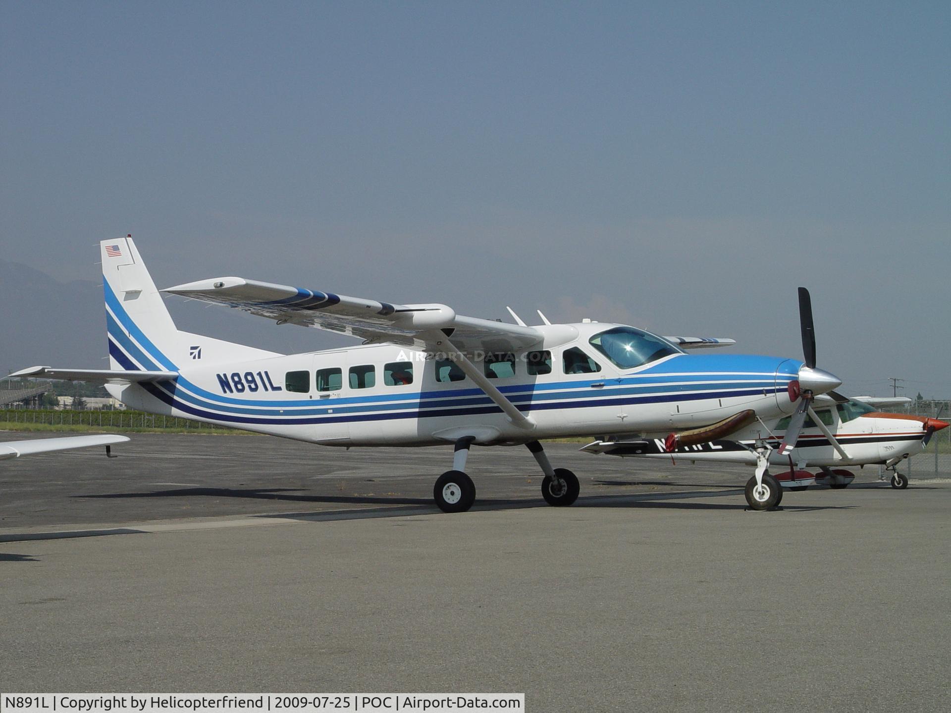N891L, 2002 Cessna 208B Grand Caravan C/N 208B0938, Parked at Howard Aviation