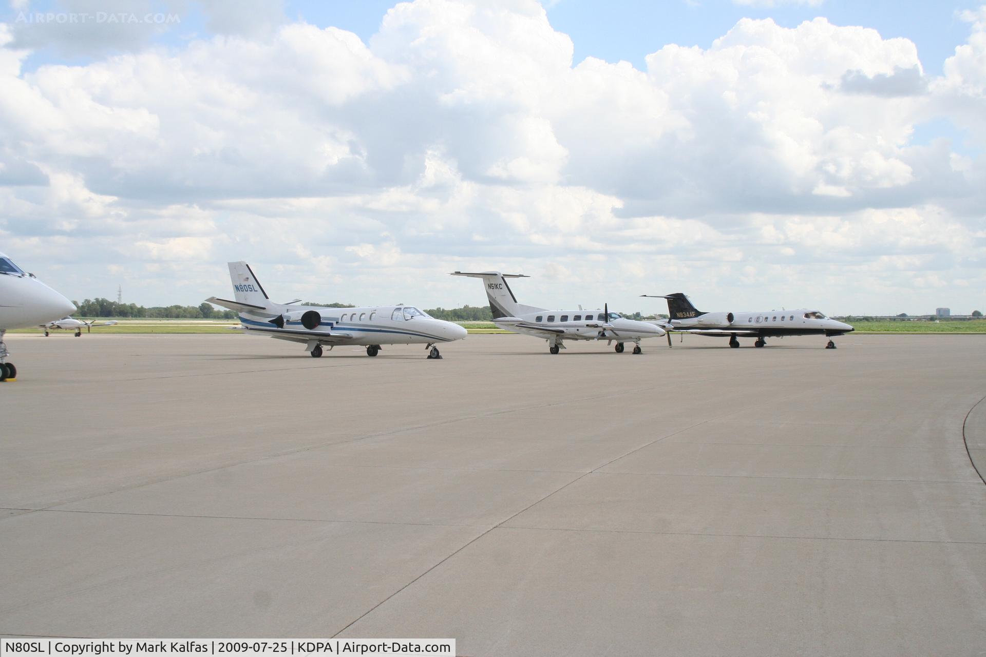 N80SL, 1979 Cessna 501 Citation I/SP C/N 501-0294, Cessna 501 - N80SL, Piper Cheyenne III - N51KC and Wal-Mart Learjet 31A - N834AF on the ramp KDPA