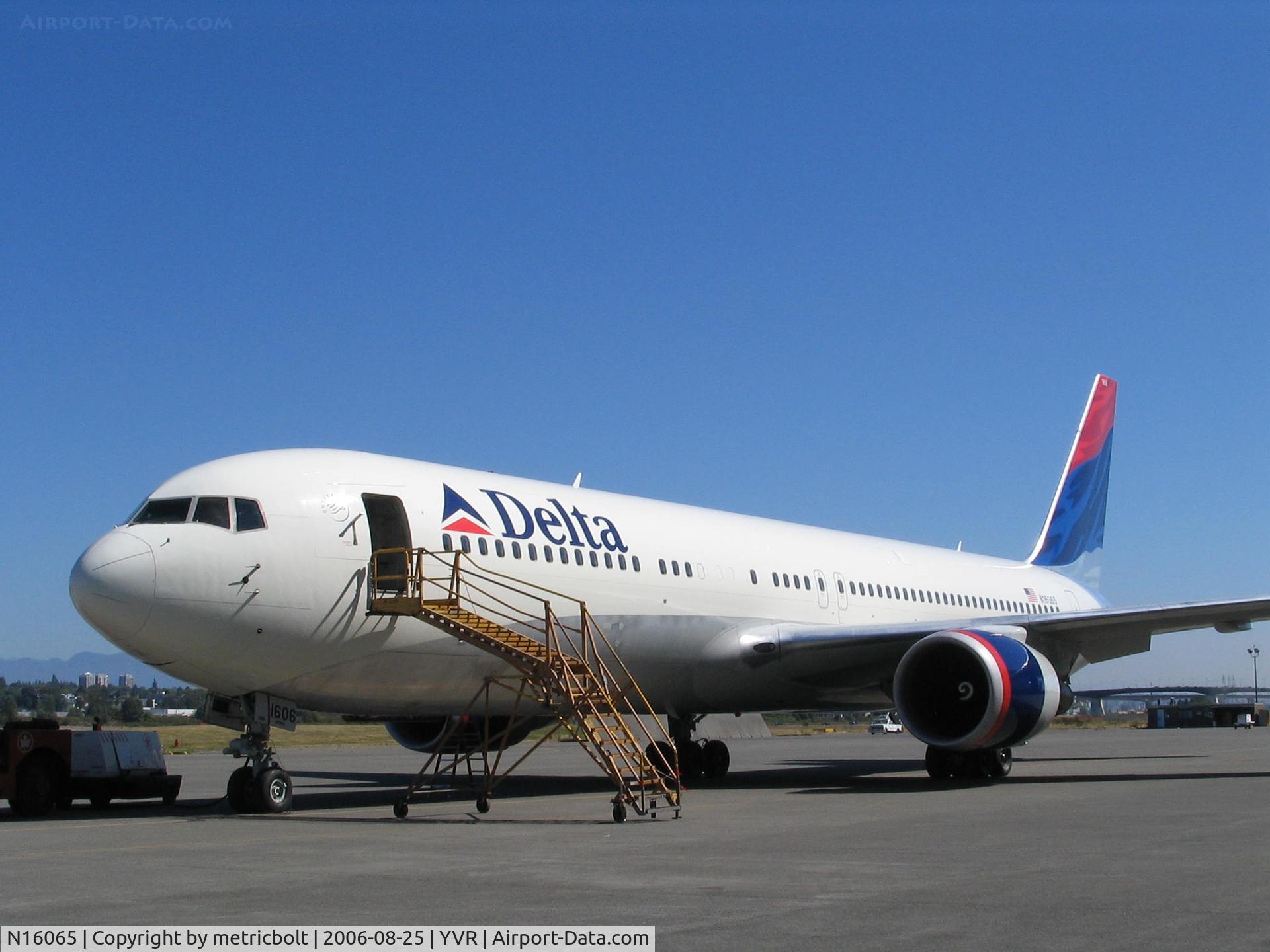 N16065, 1999 Boeing 767-332 C/N 30199, after maintenance,awaiting tow to the ramp