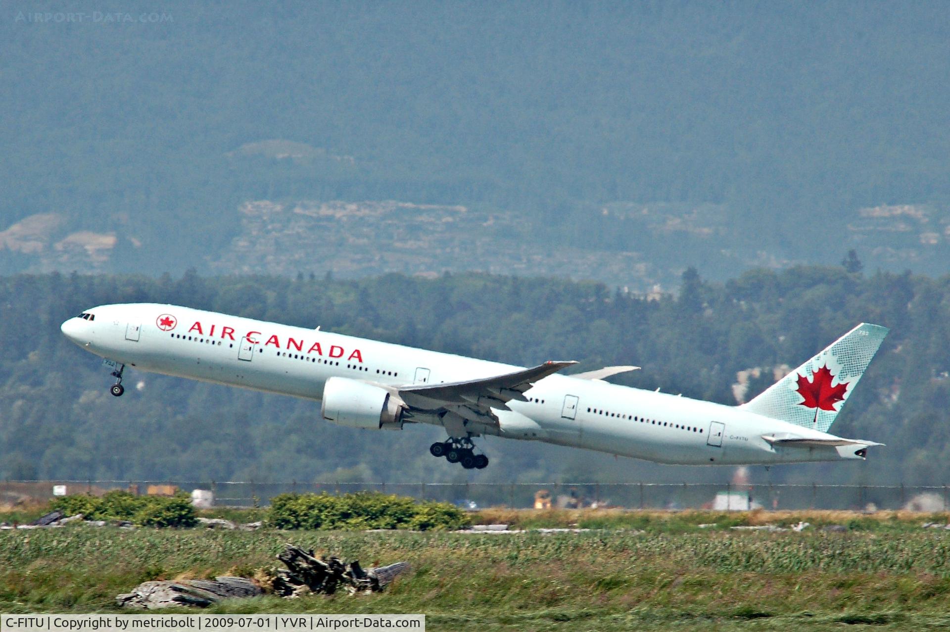 C-FITU, 2007 Boeing 777-333/ER C/N 35254, takeoff