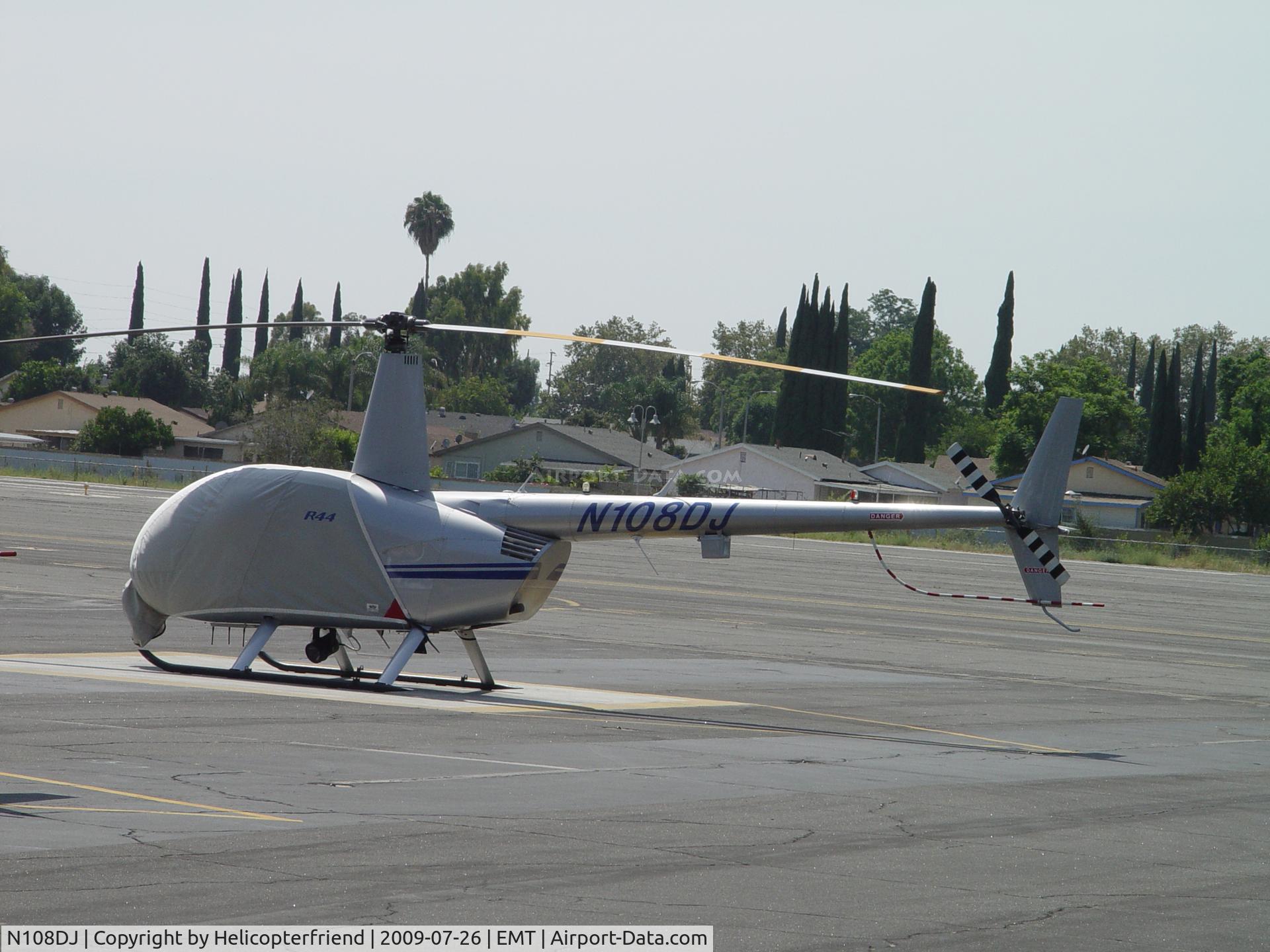 N108DJ, 2001 Robinson R44 C/N 1060, All covered up and parked at El Monte
