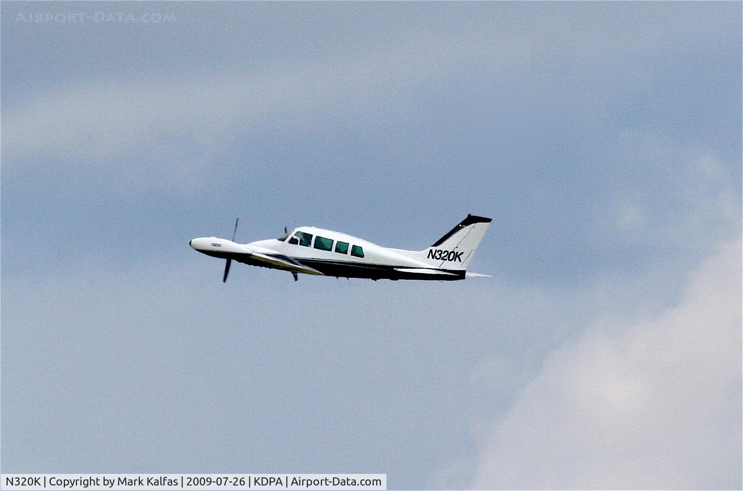 N320K, 1961 Cessna 320 Skyknight C/N 320-0018, Cessna 320 N320K, departing RWY 2R KDPA.