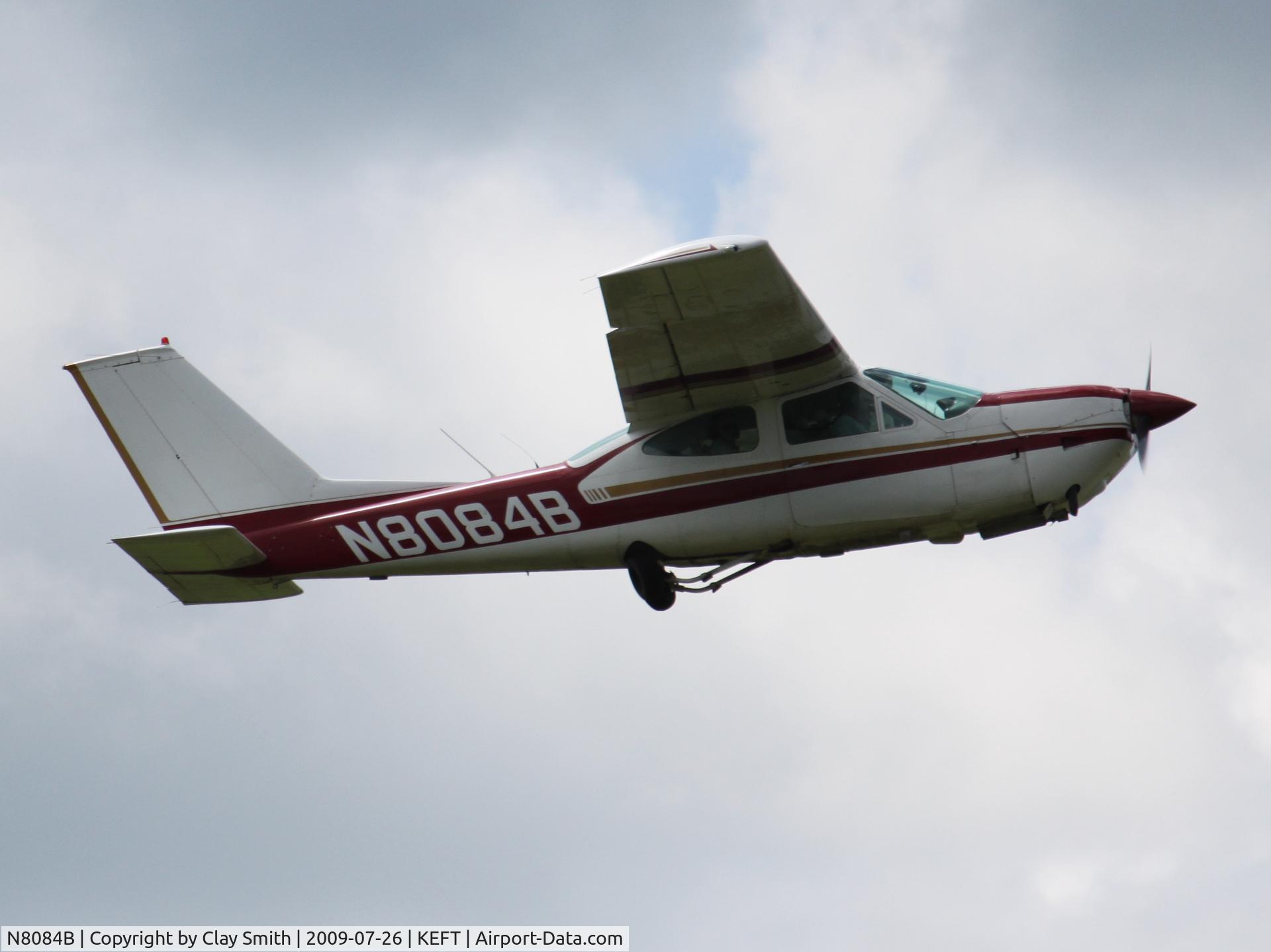 N8084B, 1975 Cessna 177RG Cardinal C/N 177RG0705, Main gear almost fully retracted on takeoff.