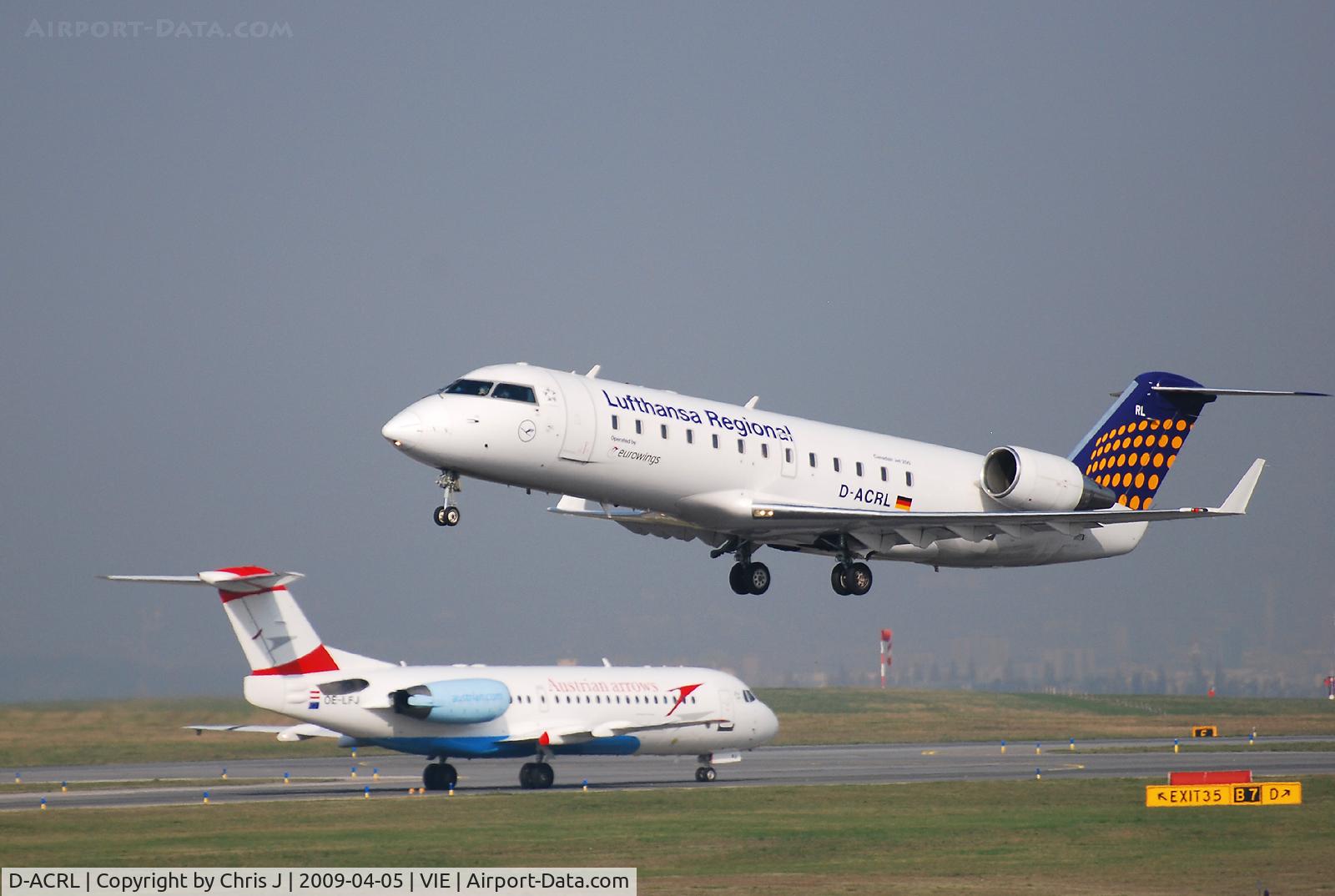D-ACRL, 2004 Bombardier CRJ-200ER (CL-600-2B19) C/N 7902, Canadair RJ200 with OE-LFJ in the background