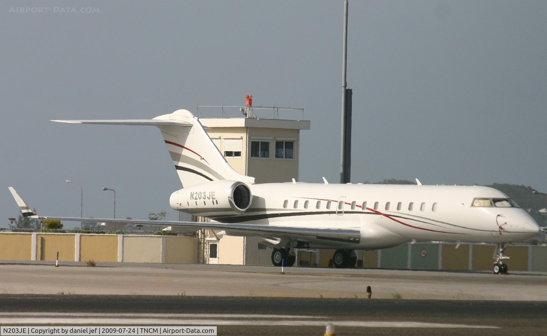 N203JE, 1999 Bombardier BD-700-1A11 Global 5000 C/N 9019, park at the Charly ramp basking in the afternoon sun.