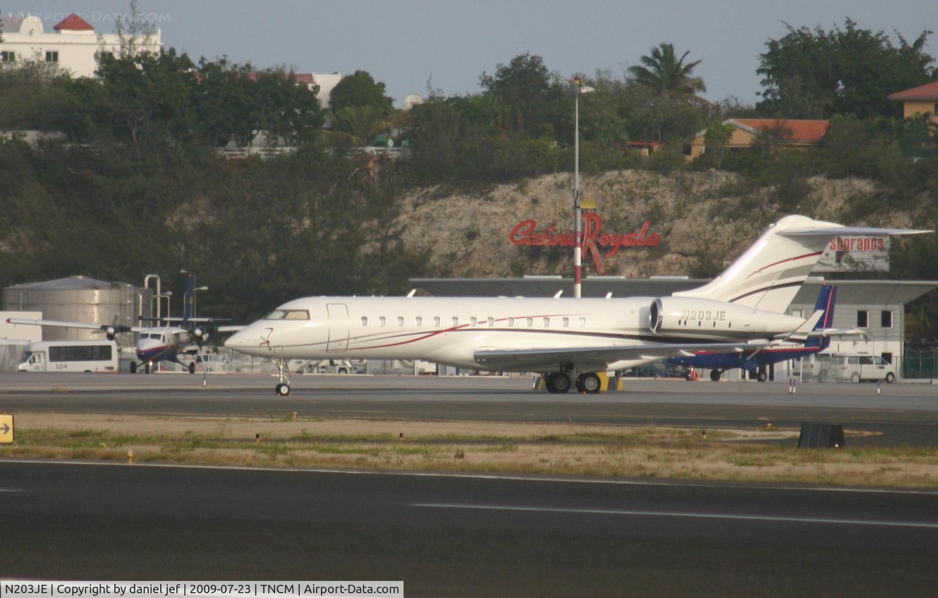 N203JE, 1999 Bombardier BD-700-1A11 Global 5000 C/N 9019, park at the Charly ramp basking in the afternoon sun.