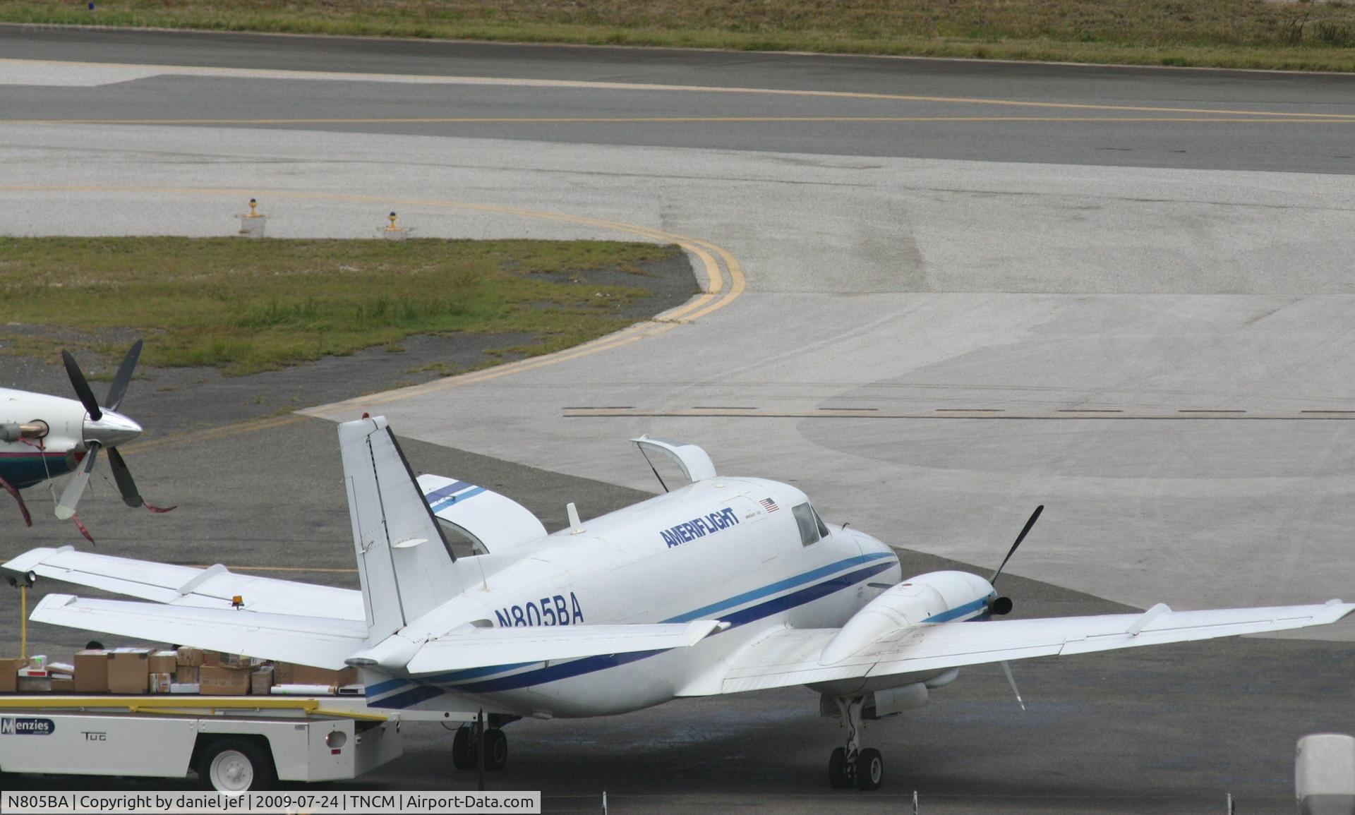 N805BA, 1971 Beech 99A C/N U-147, bringing the mail for us. ....  park at the cargo ramp