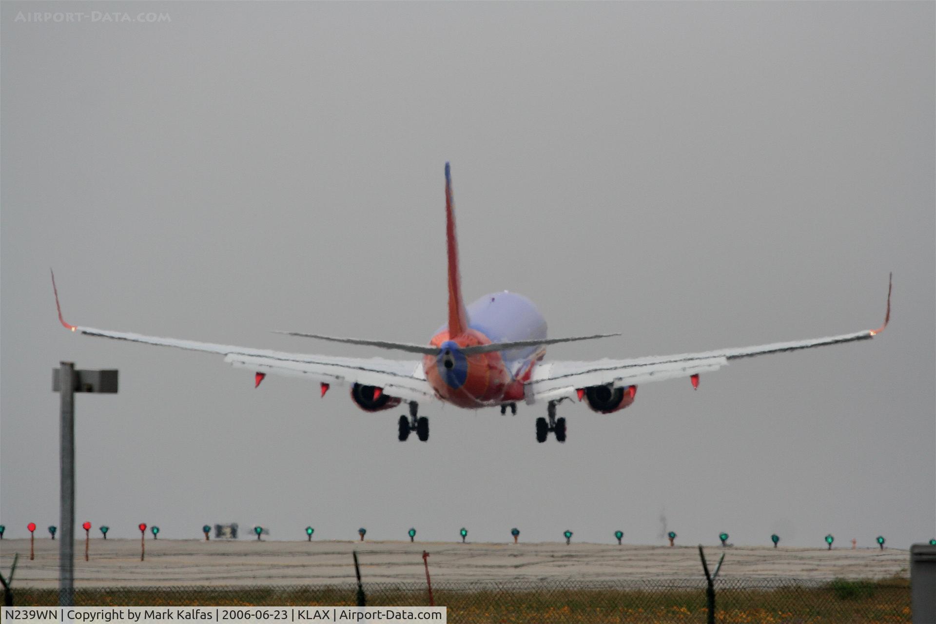 N239WN, 2006 Boeing 737-7H4 C/N 34714, Southwest Boeing 737-7H4, N239WN short final 24R KLAX.
