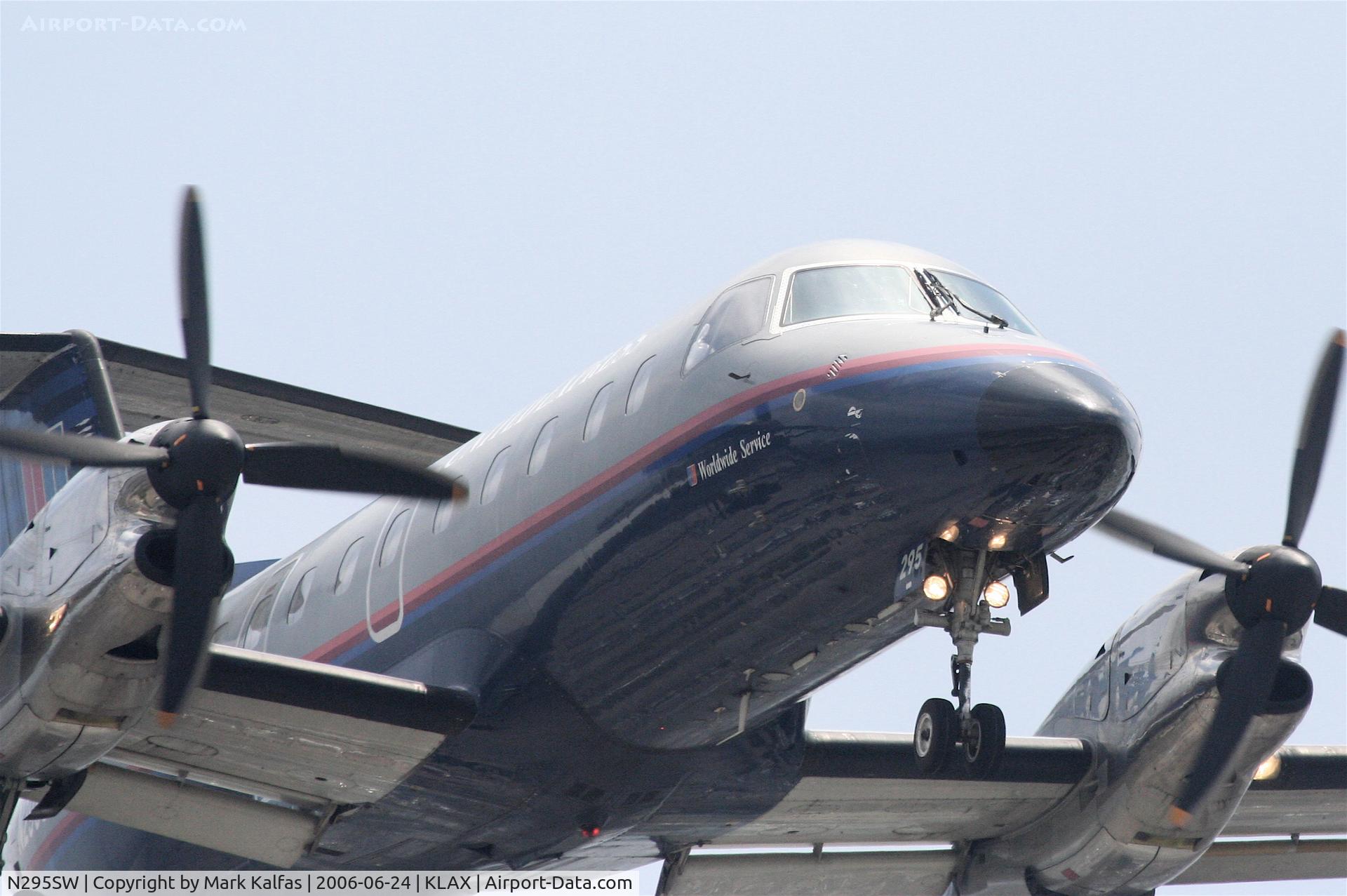 N295SW, 1996 Embraer EMB-120ER Brasilia C/N 120.322, Skywest Embraer EMB-120ER, N295SW short final RWY 24R KLAX.