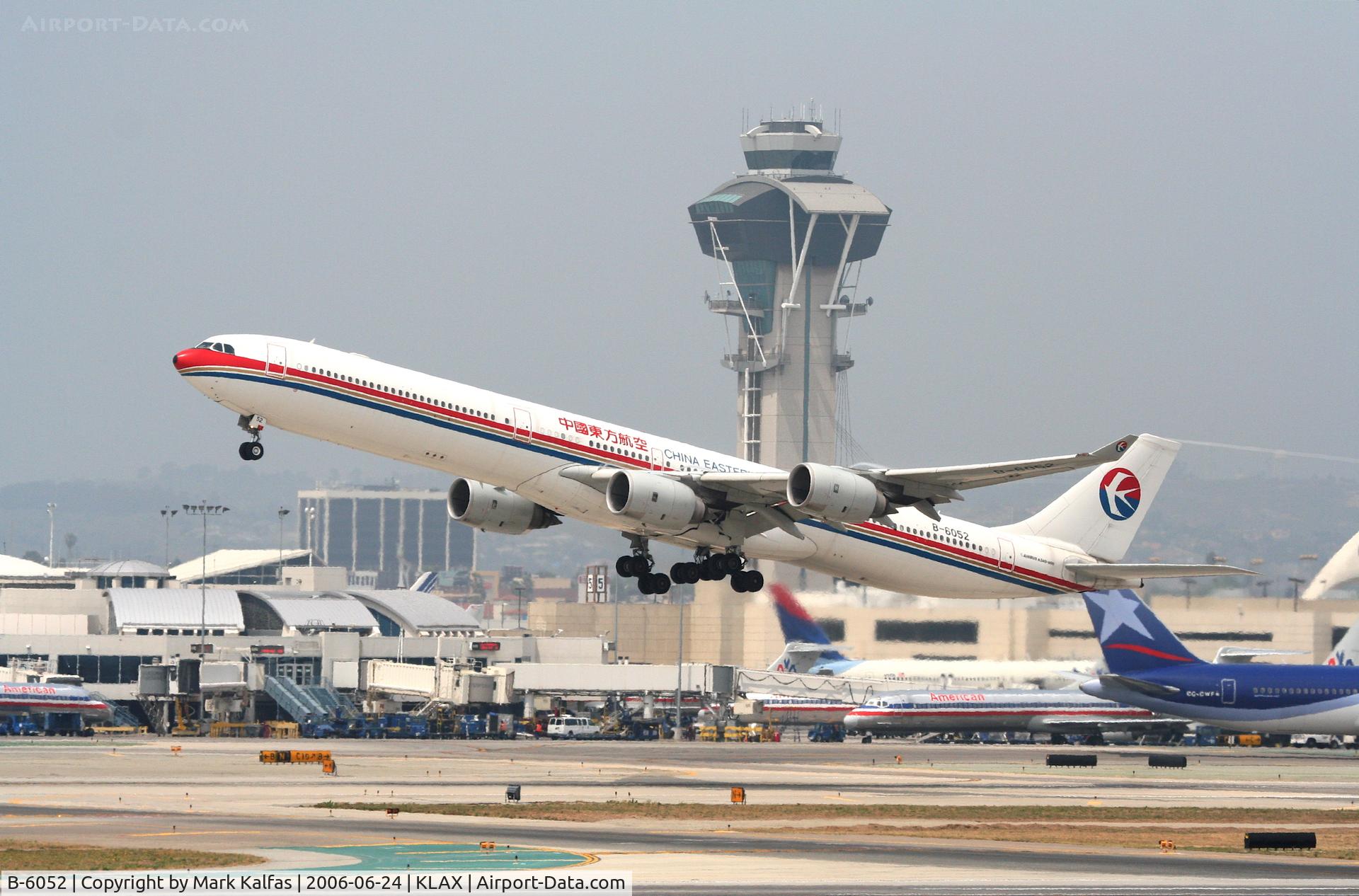B-6052, 2003 Airbus A340-642 C/N 514, China Eastern A340-642, B-6052 departing 25R KLAX.