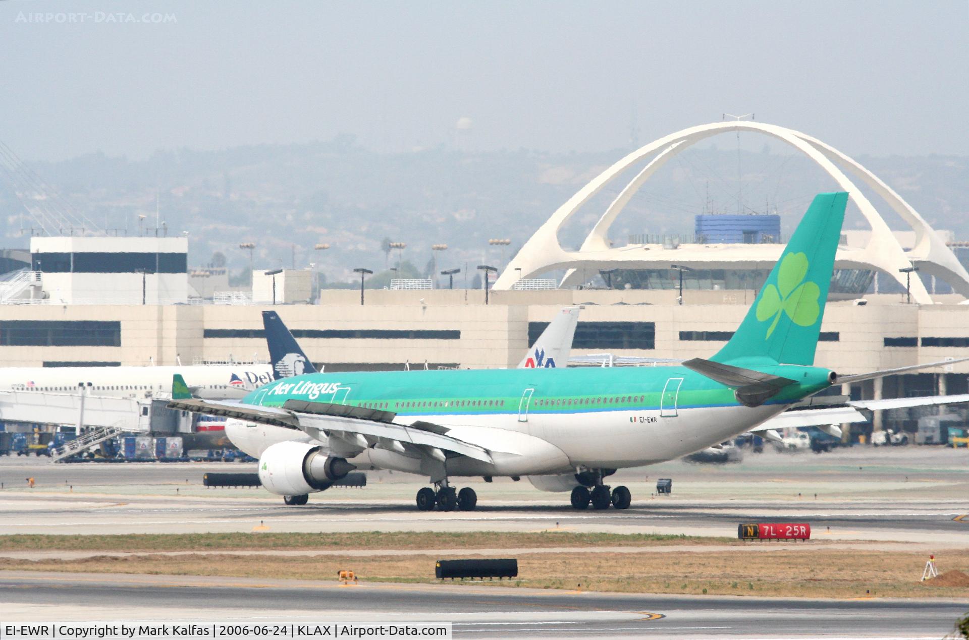 EI-EWR, 2000 Airbus A330-202 C/N 330, Aer Lingus A330-202, EI-EWR taxiing off of 25L to the gate KLAX.
