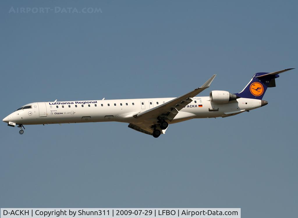 D-ACKH, 2006 Bombardier CRJ-900LR (CL-600-2D24) C/N 15085, Landing rwy 32L with additional '50 Jahre' sticker...