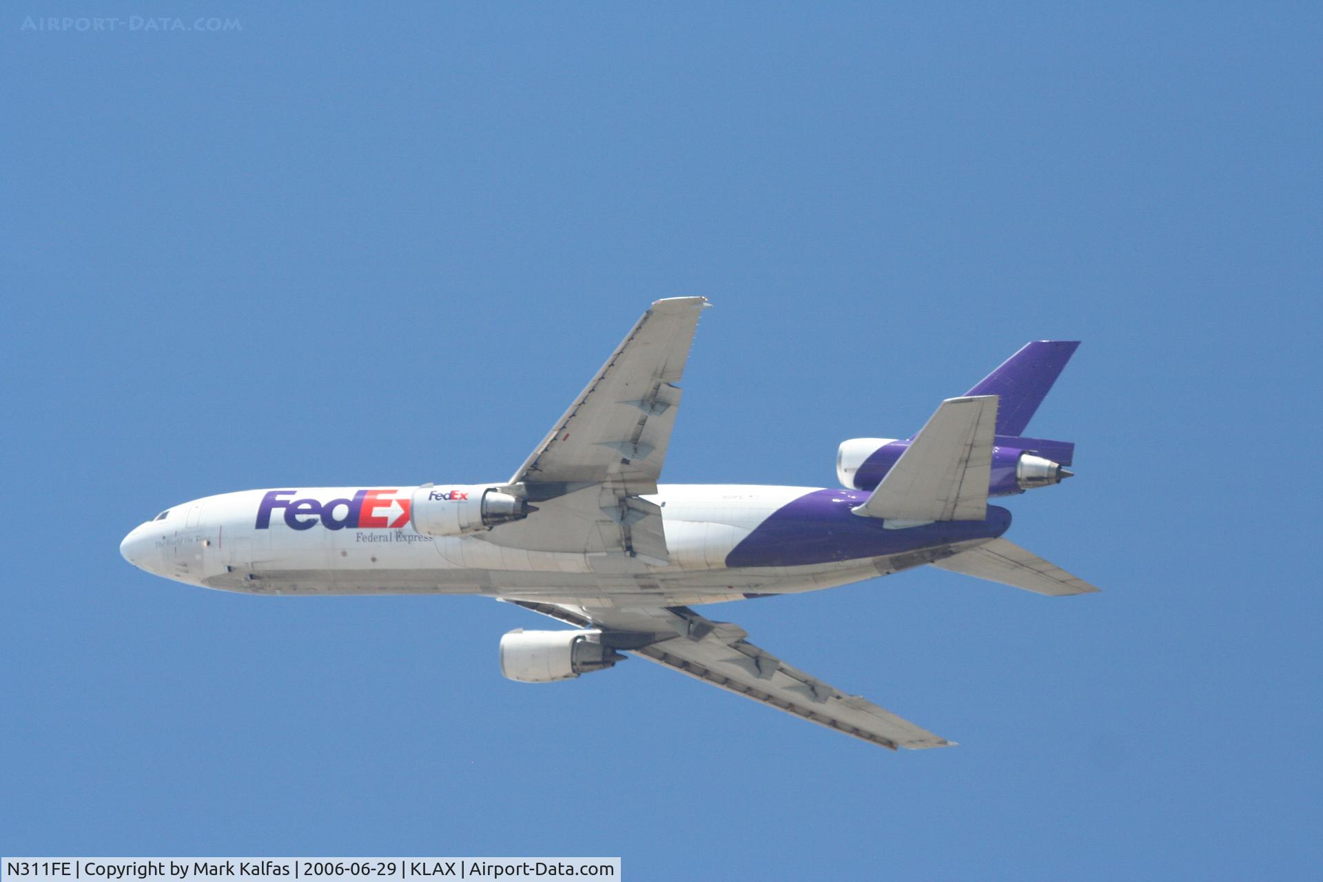 N311FE, 1975 McDonnell Douglas DC-10-30F C/N 46871, FedEx DC-10-10F, N311FE departing 25L KLAX.