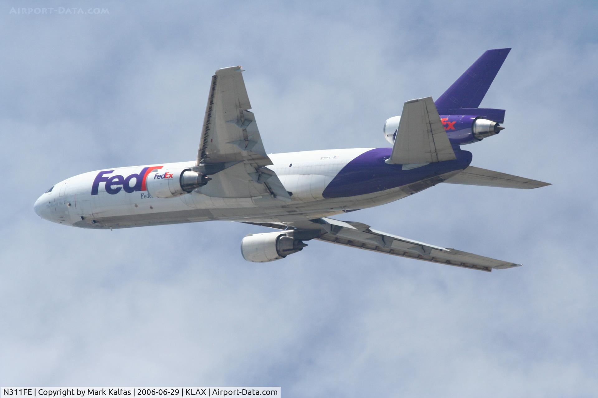 N311FE, 1975 McDonnell Douglas DC-10-30F C/N 46871, FedEx DC-10-10F, N311FE departing 25L KLAX.