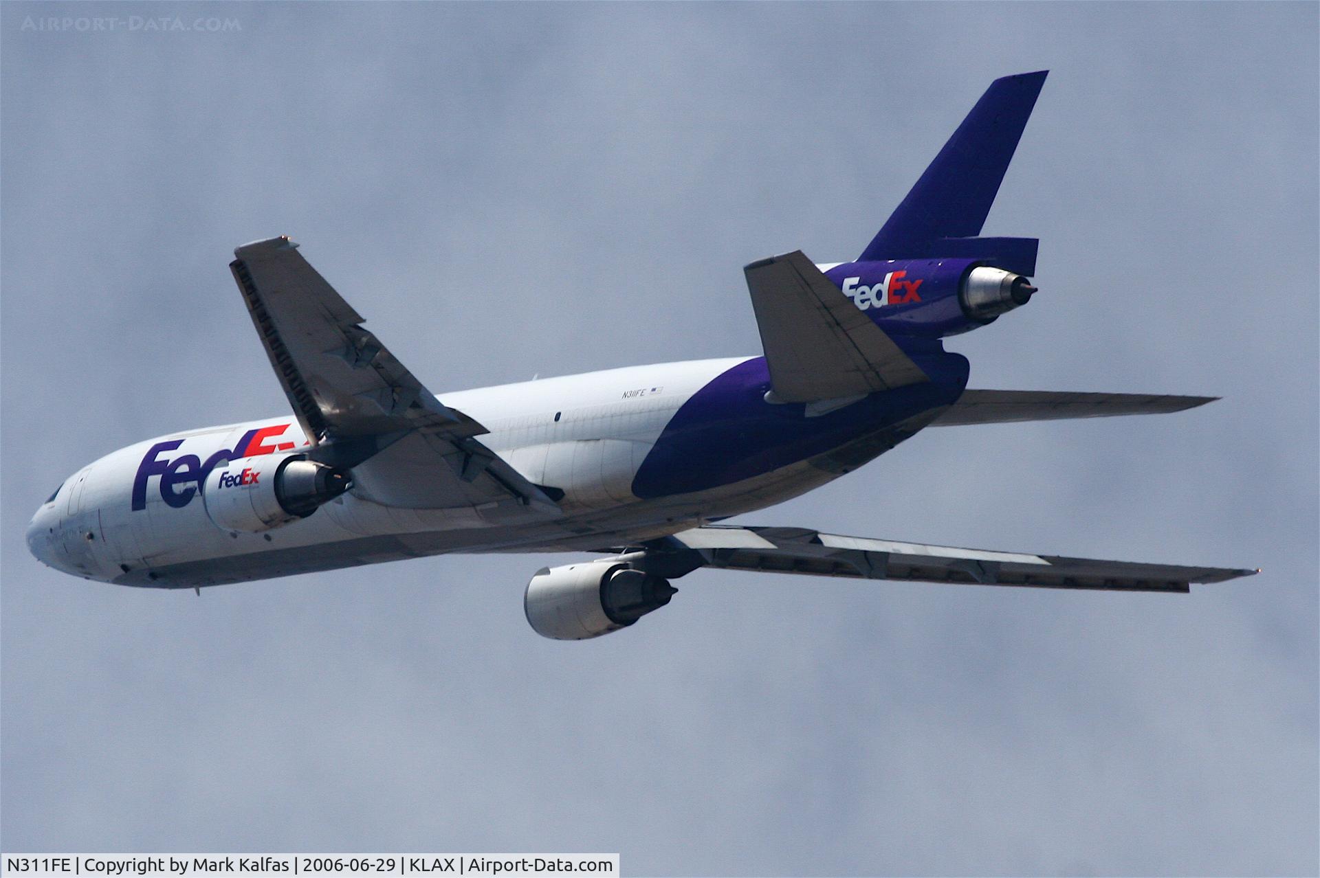 N311FE, 1975 McDonnell Douglas DC-10-30F C/N 46871, FedEx DC-10-10F, N311FE departing 25L KLAX.