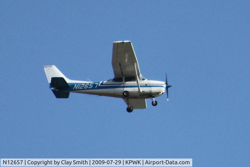 N12657, 1973 Cessna 172M C/N 17262152, Transitioning over Chicago Executive.